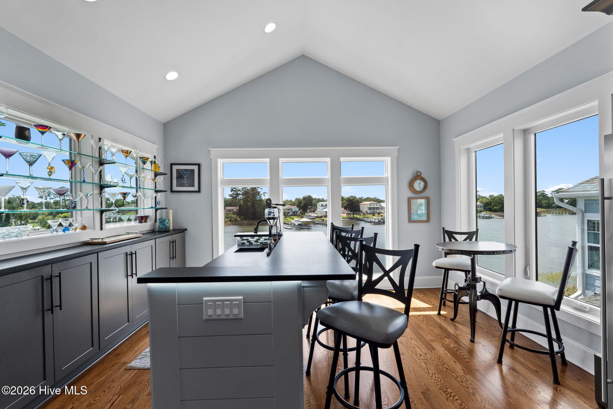 Bar area seats 4 plus room for a pub table behind - 2775 Long Bay Drive SE, Southport, NC 28461