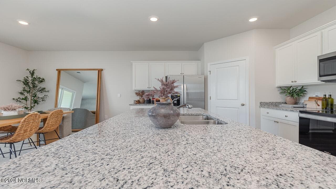 Single Family Residence at 1303 Woodhouse Drive NW, Ash, NC 28420, photo 7 of 26