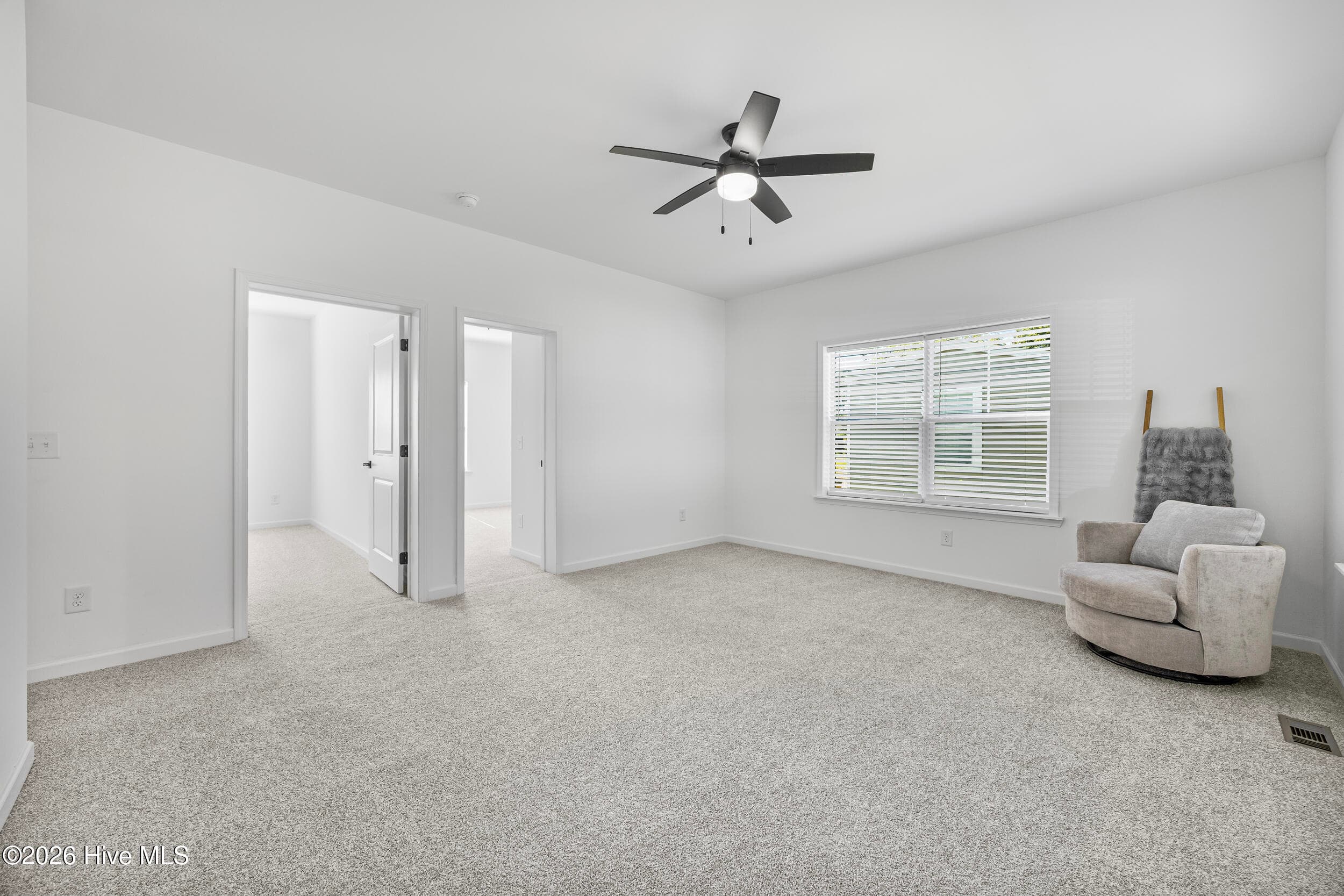 Located between bedroom 2 and 3. Use your imagination...options are endless. - 771 Factory Road, Hampstead, NC 28443