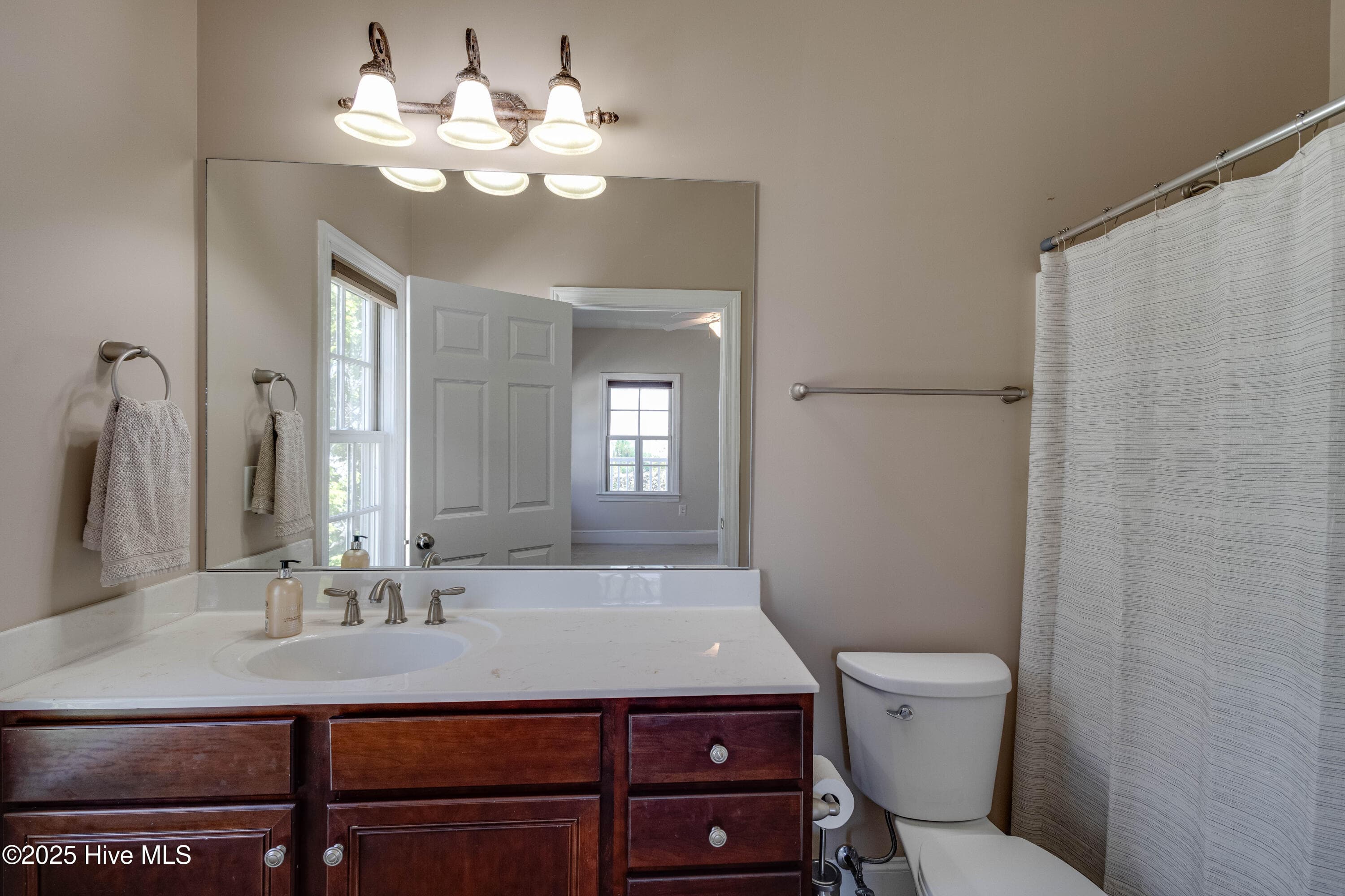 Bathroom with Adjoins to Bedroom #3. - 207 S Academy Street, Washington, NC 27889