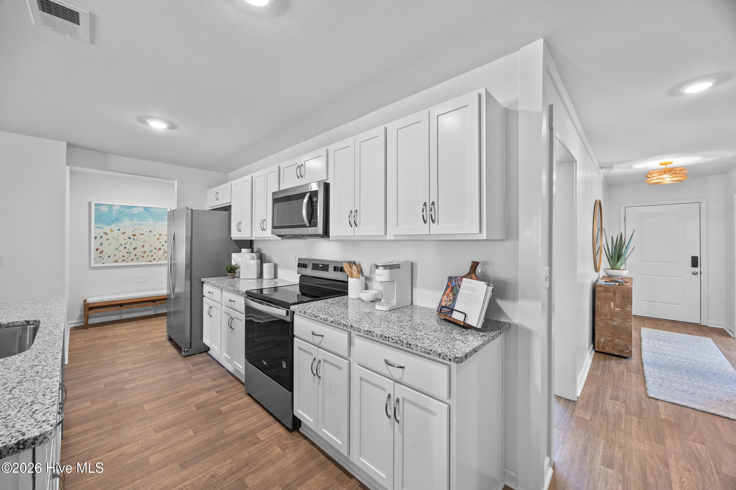 Home shown is a representation of the floor plan and may include optional features or upgrades. Elevations, materials, colors, finishes, and included features may vary from the actual home. Please consult a Sales Representative for complete details. - 544 Belfort Lane SW 156, Ocean Isle Beach, NC 28469