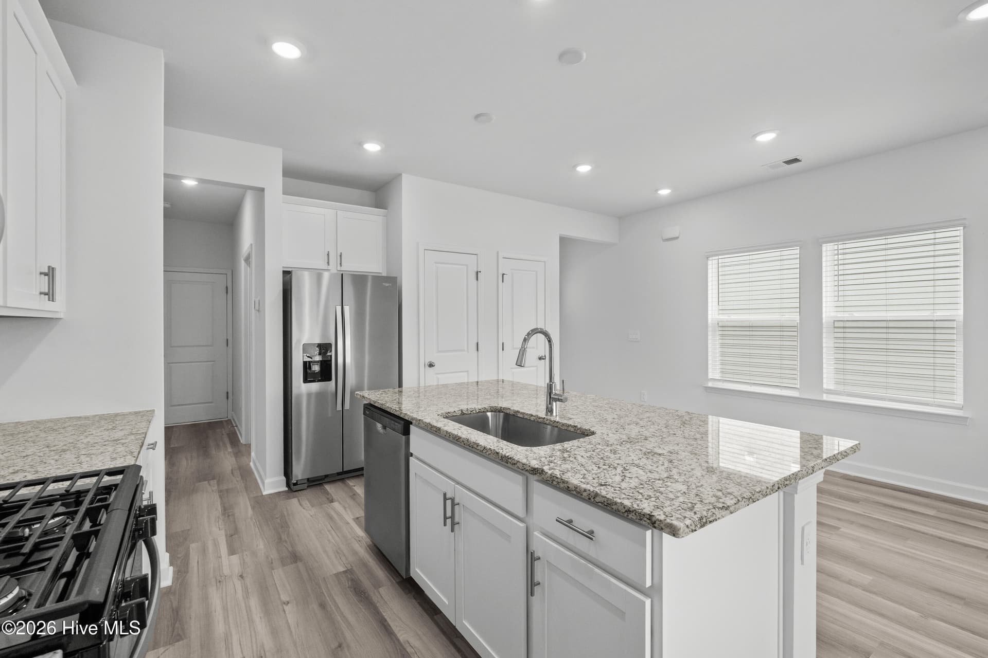 Photo is not of the actual home, but is an example photo of a completed home and may depict options and/or features that are not included - 2217 Lewis Allen Crossing NW, Ash, NC 28420