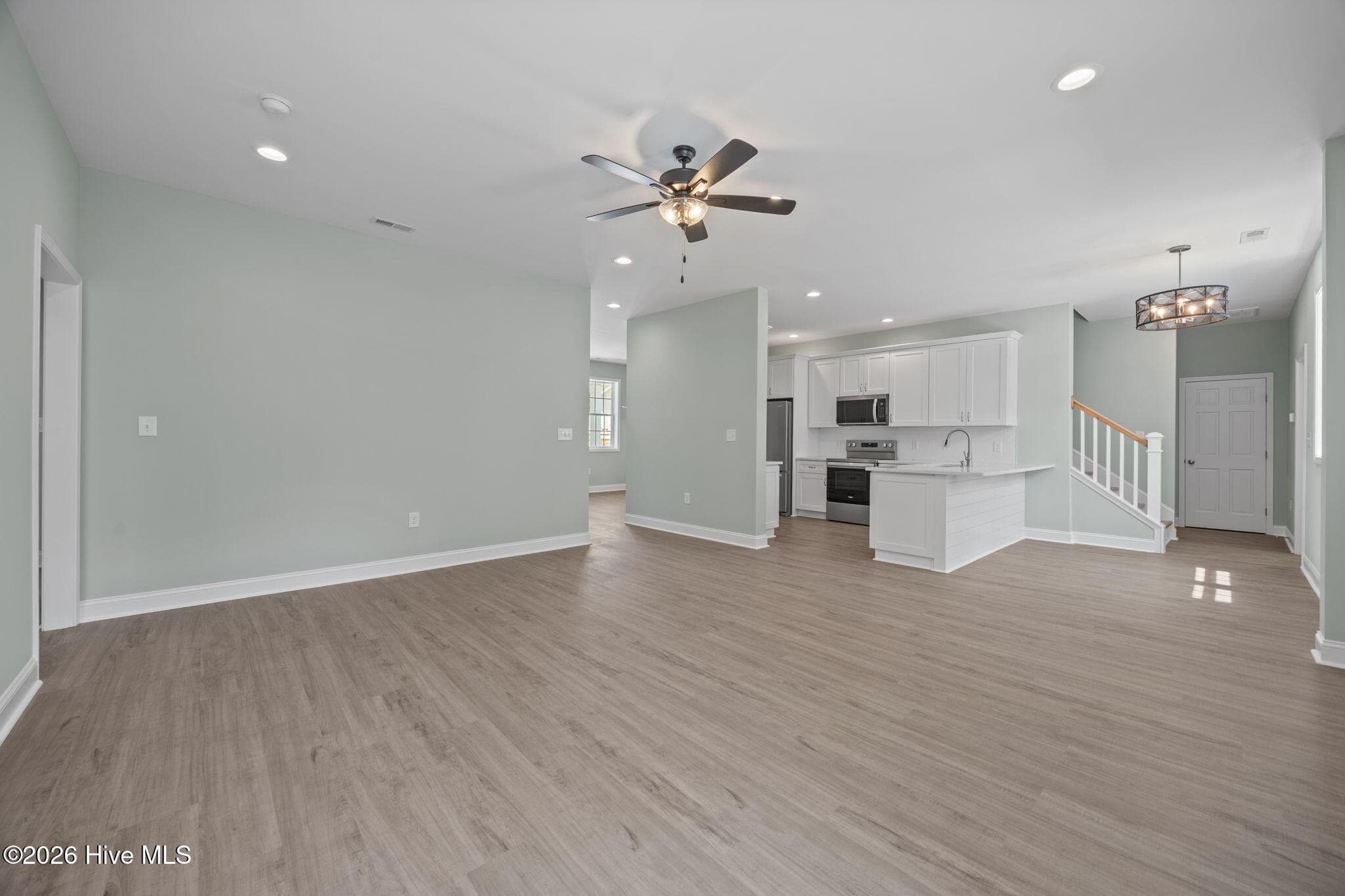 Living room into kitchen - 7407 Archers Creek Court, Emerald Isle, NC 28594, Emerald Isle
