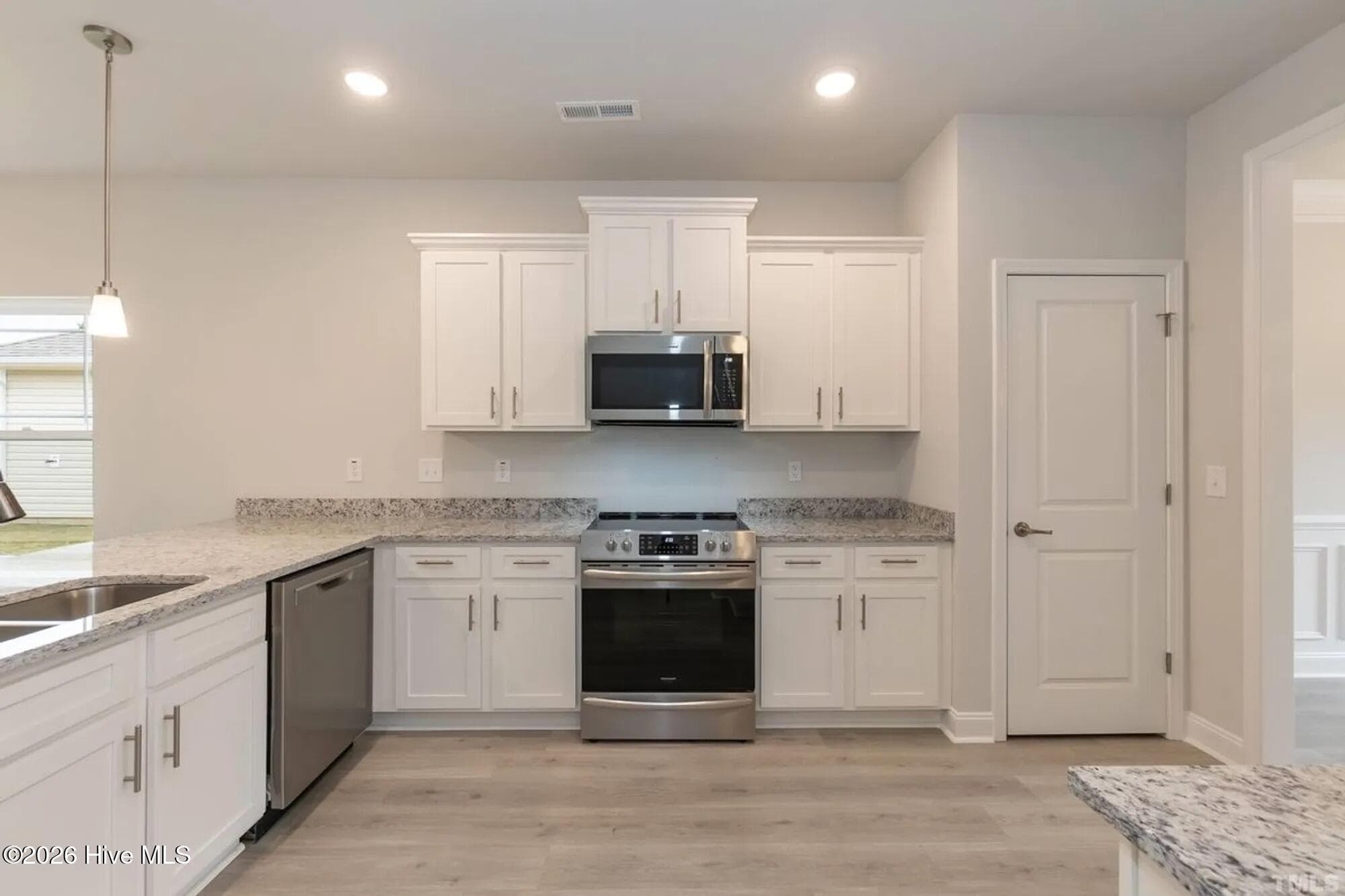 Only $1000 down and financial incentives offered with use of a preferred lender. Photos are of the same floor plan in a different community and are for layout purposes only. Upgrades, colors and finishes may differ. *This home is still under construction* - 3138 Firefly Trail, Grimesland, NC 27837