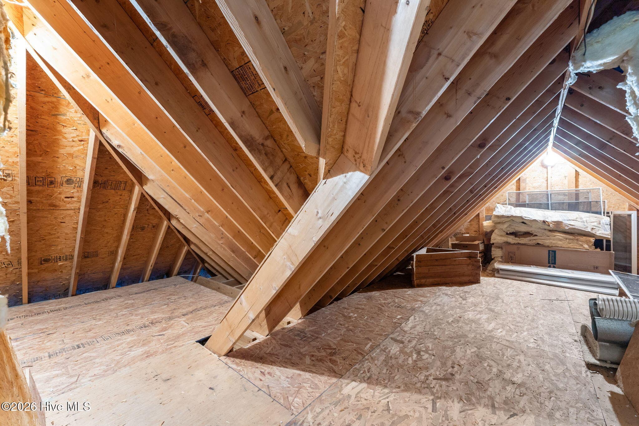 More attic storage area accessible through the upper bedroom #3. - 22 Lochmere Drive, Pinehurst, NC 28374