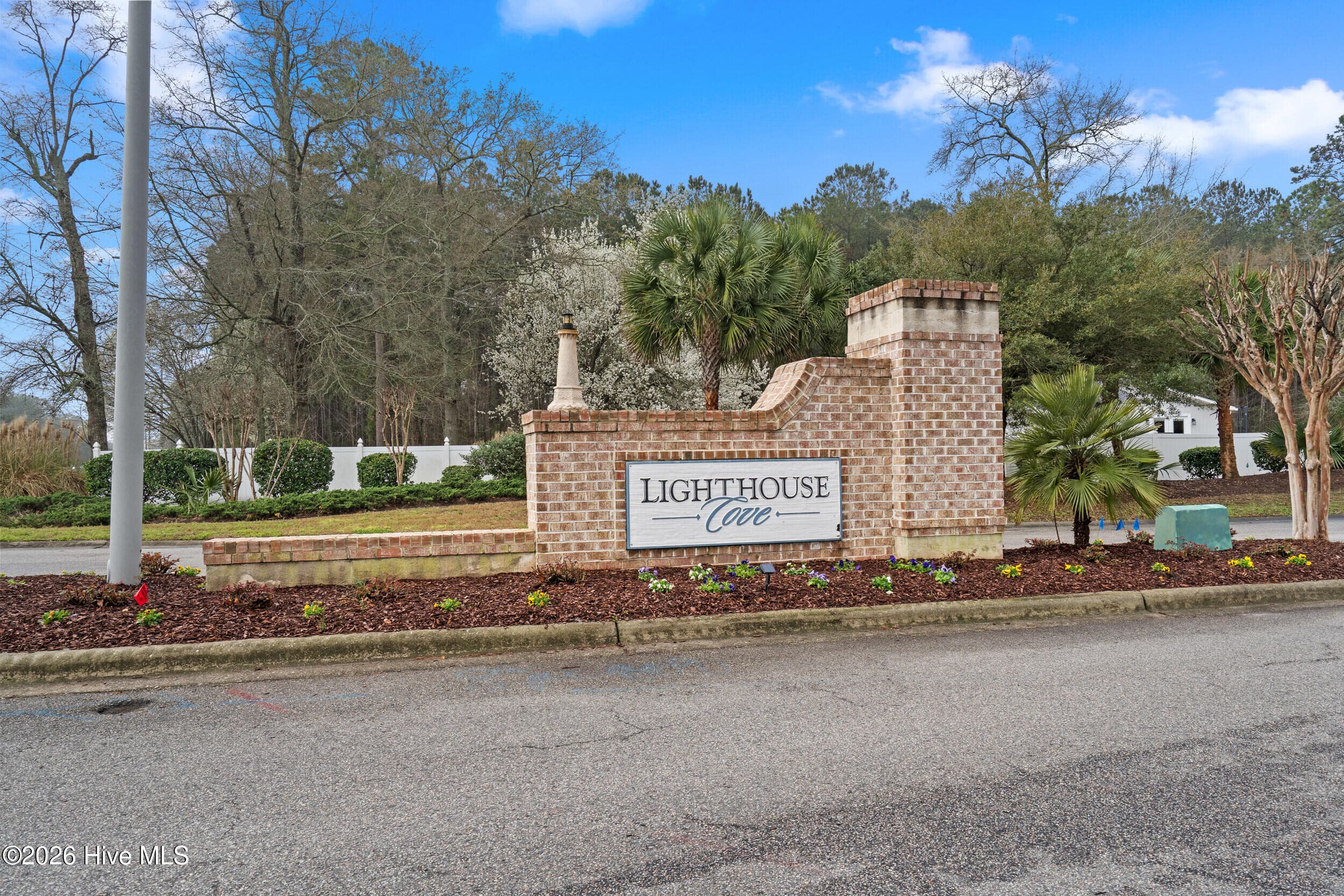 Single Family Residence at 737 Landmark Cove, Carolina Shores, NC 28467, photo 3 of 3