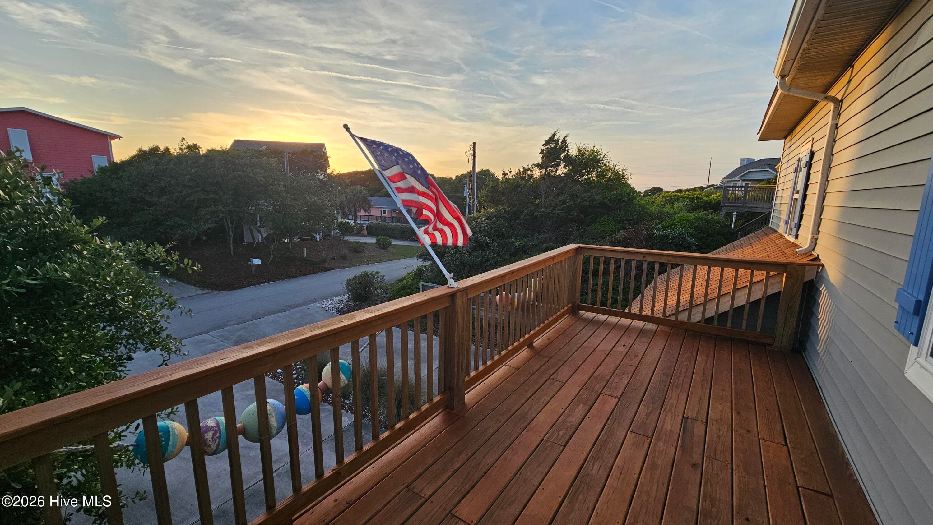 View of the sun setting front deck - 102 W Scotch Bonnet Drive, Emerald Isle, NC 28594