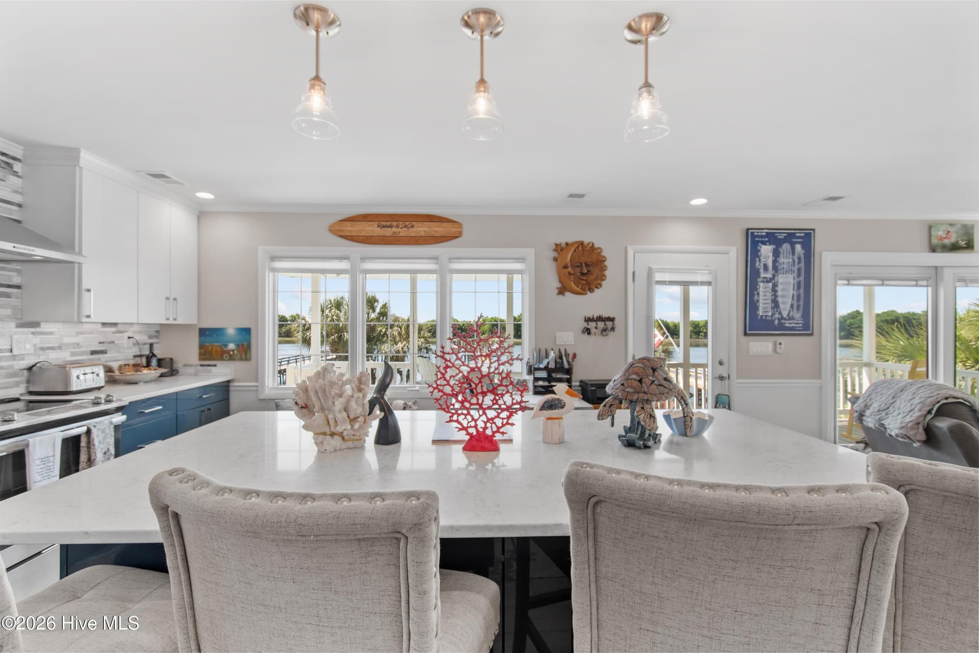 Large kitchen island with seating. - 2024 Camelot Drive SW, Ocean Isle Beach, NC 28469