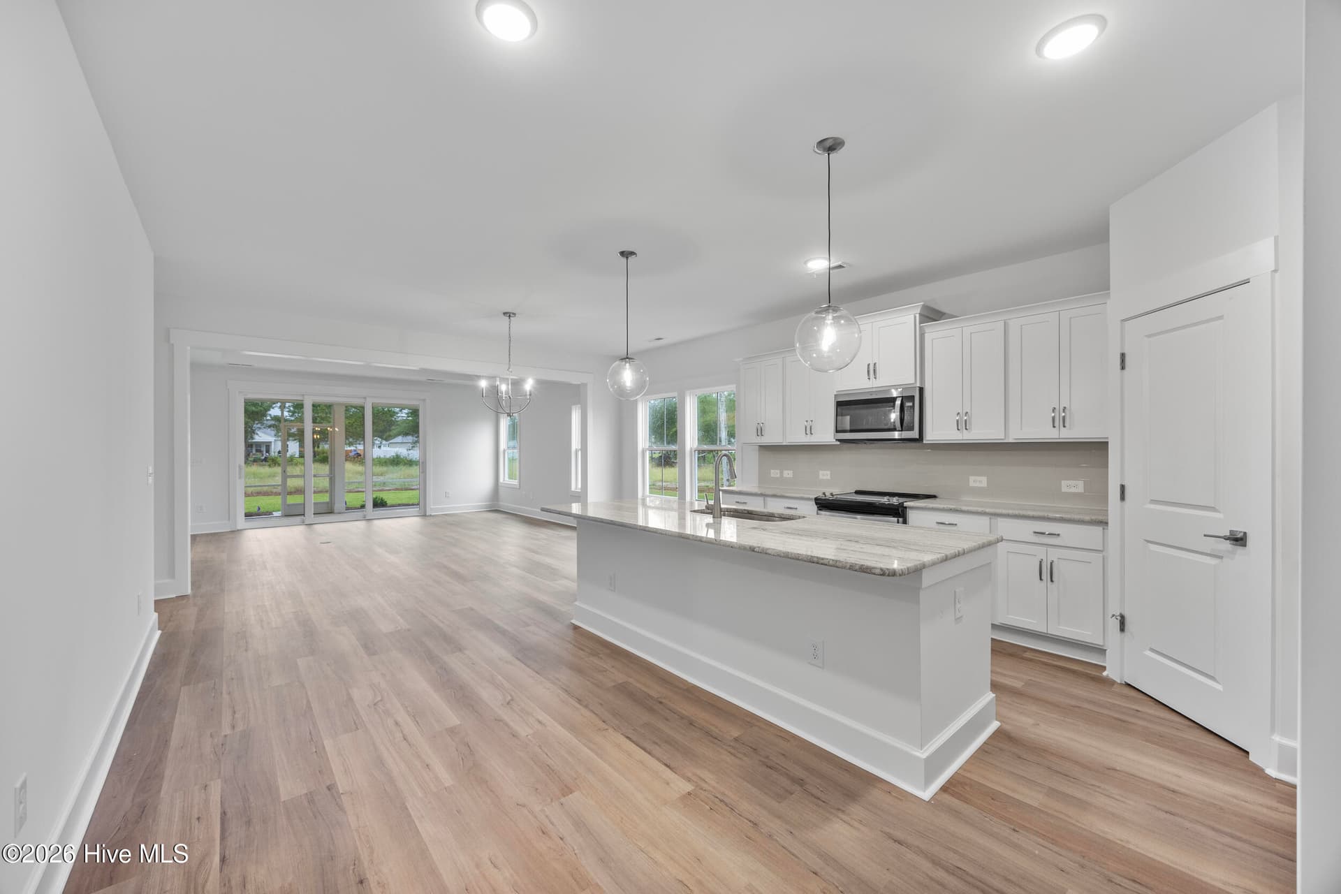 Home shown is a representation of the floor plan and may include optional features or upgrades. Elevations, materials, colors, finishes, square footage, and included features may vary from the actual home. Please consult a Sales Representative for complete details. - 4491 Village Green Drive SW Homesite 93, Shallotte, NC 28470
