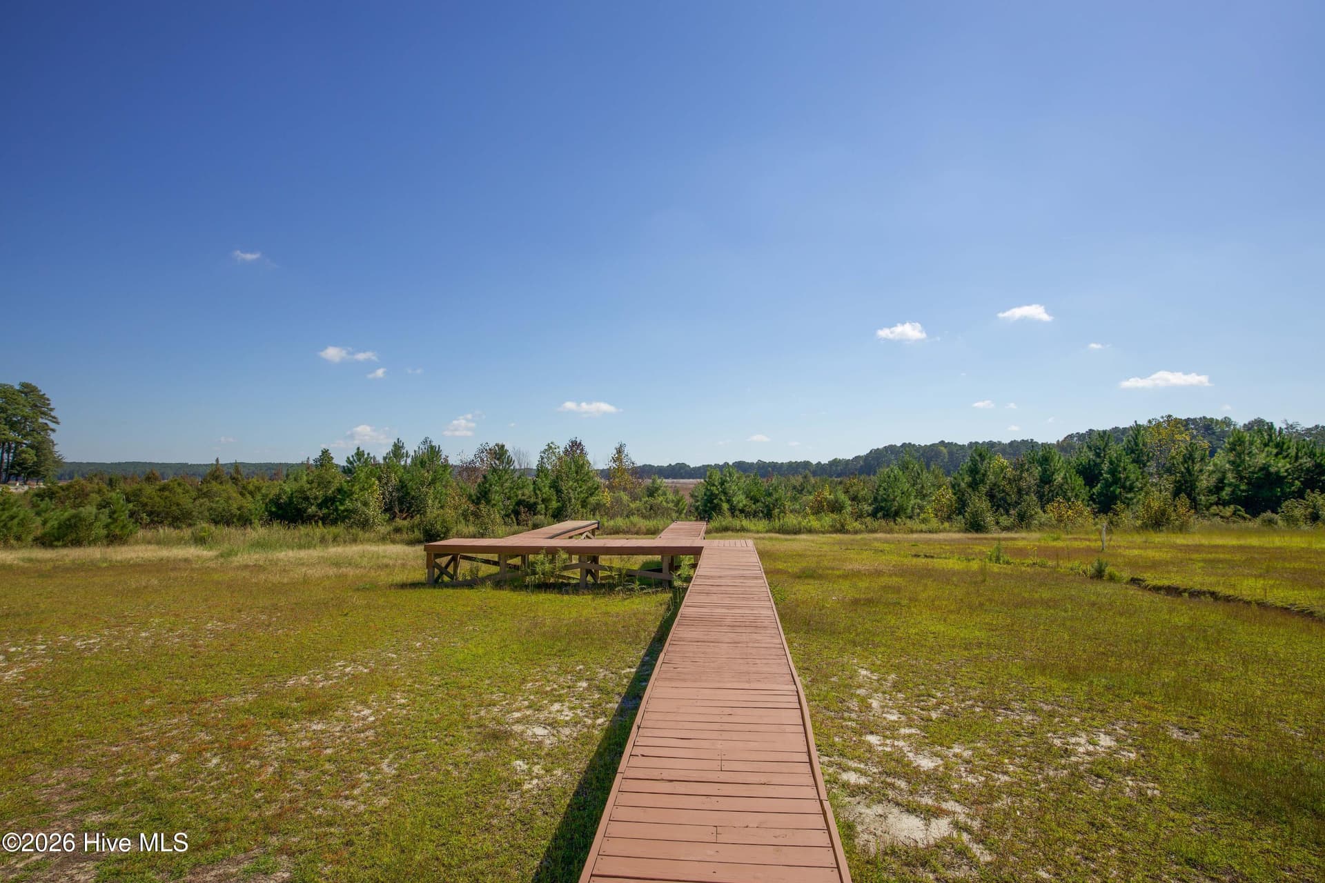 Dock walkway extending across the dry (currently) lakebed. - 899 Seagull Drive, Vass, NC 28394
