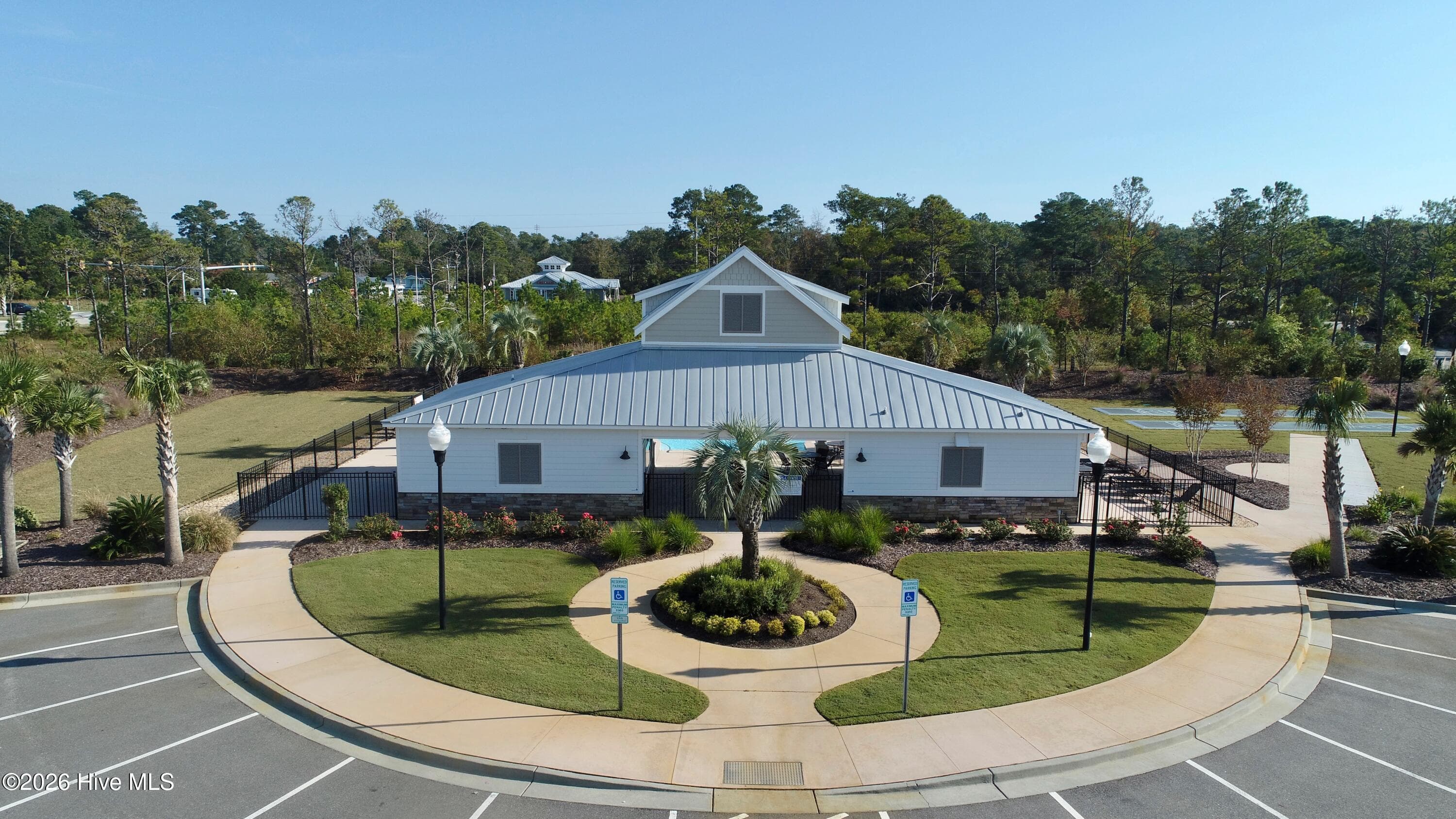 Community pool with plenty of parking. - 6358 Bryson Drive SW, Ocean Isle Beach, NC 28469