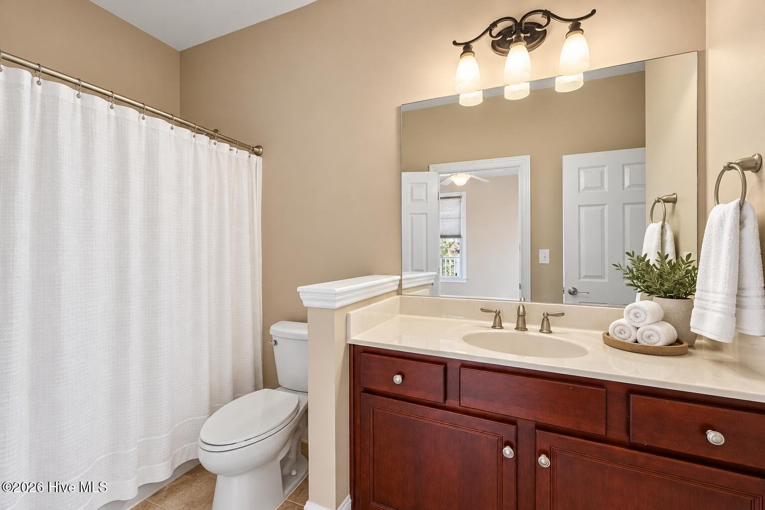 Main Floor Bathroom that adjoins to bedroom. - 207 S Academy Street, Washington, NC 27889