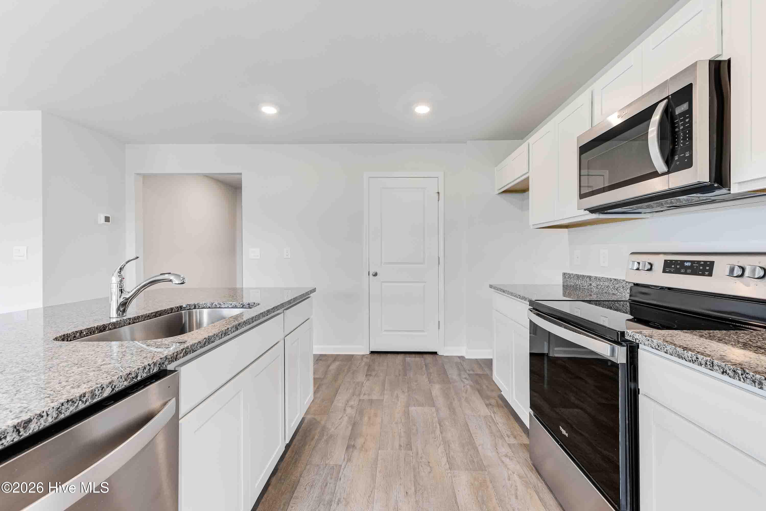 Photos are of a similar, completed home. Actual colors may vary - 3085 Golden Field Drive SE Lot 78, Bolivia, NC 28422