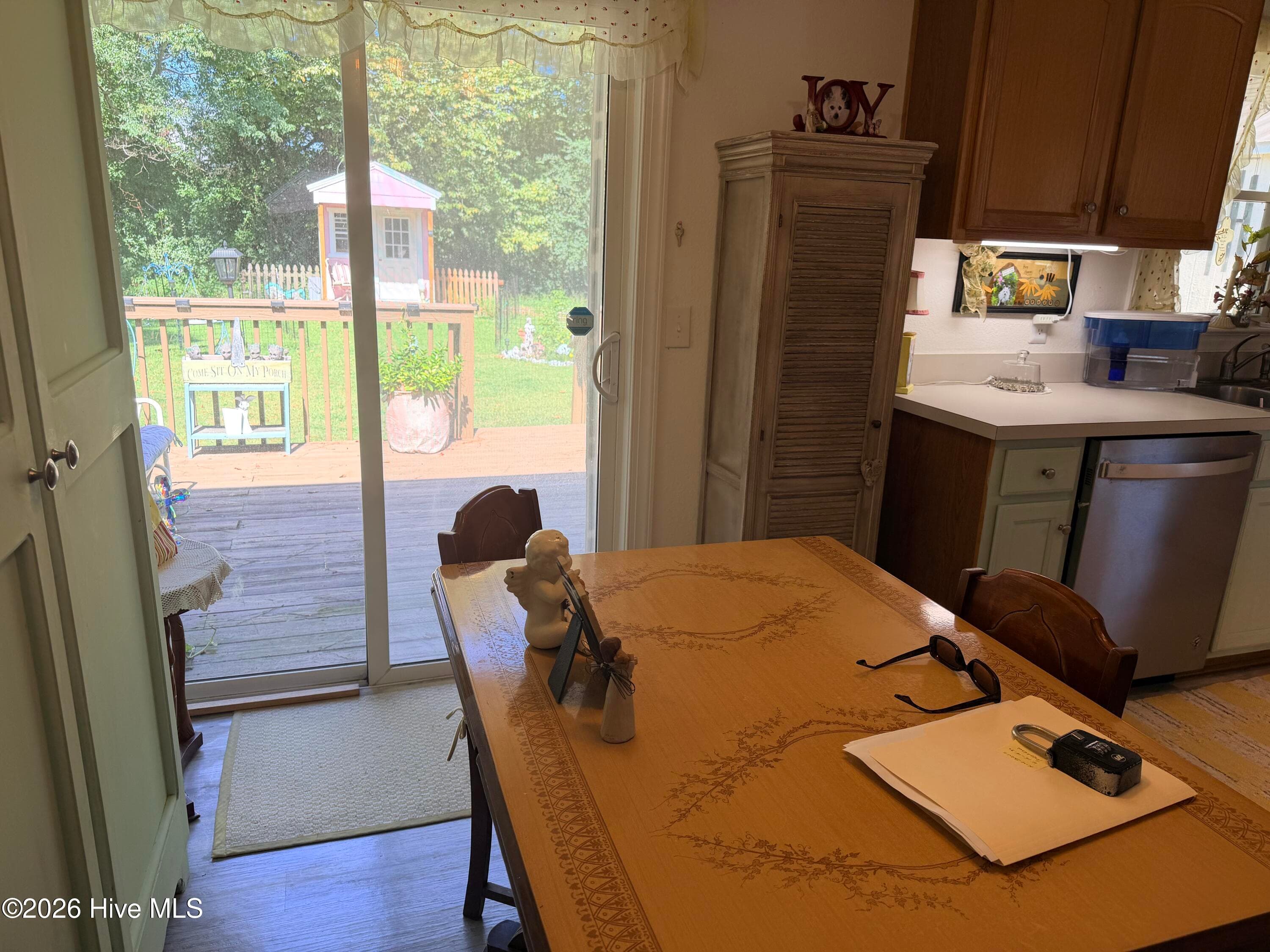 Eat-In Area/ Patio Doors to Deck - 120 Ranch Drive, Elizabeth City, NC 27909