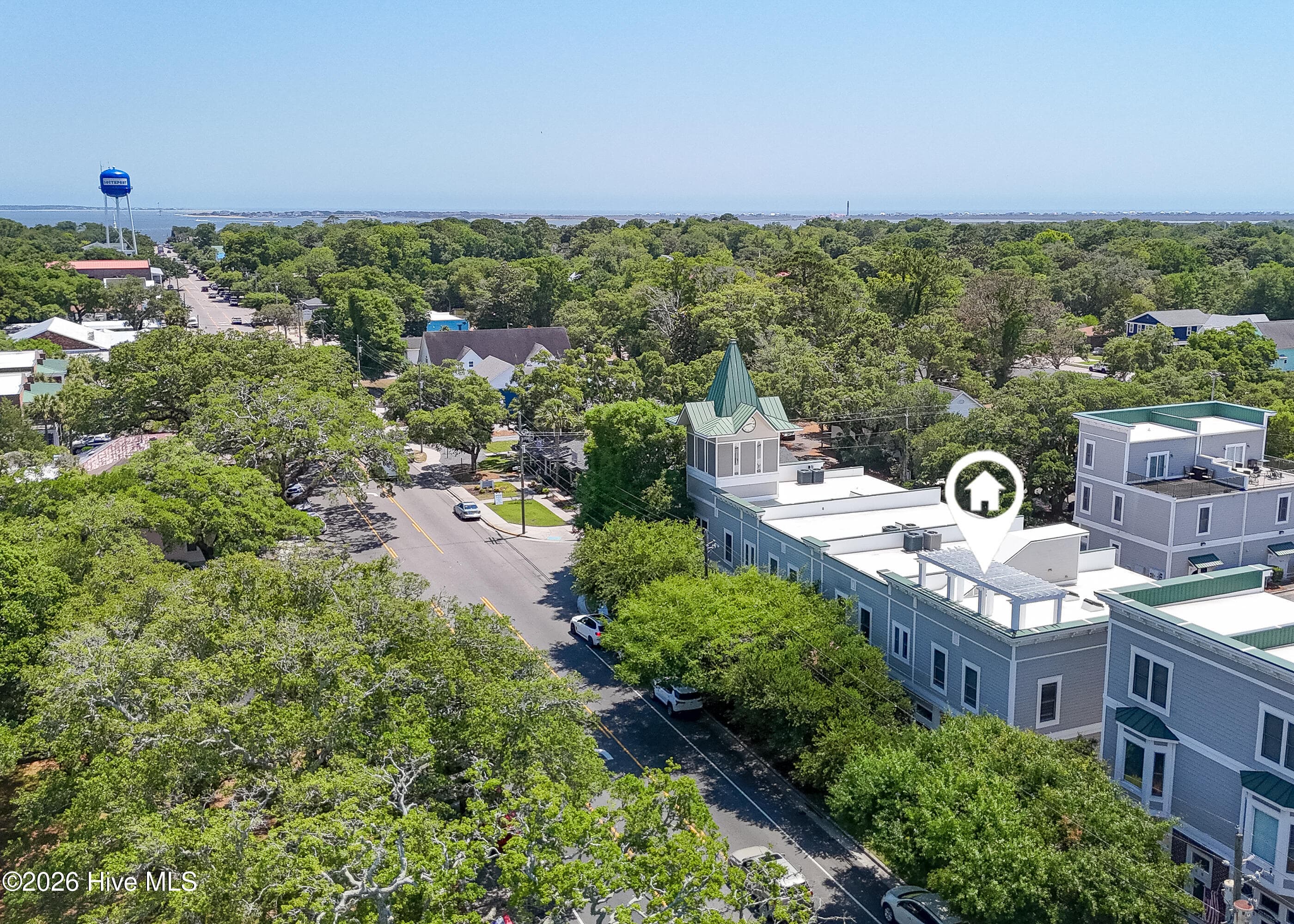 Enjoy the large rooftop deck! This is the only condo in town with a rooftop deck! Plus...a corner unit. - 701 N Howe Street 8, Southport, NC 28461