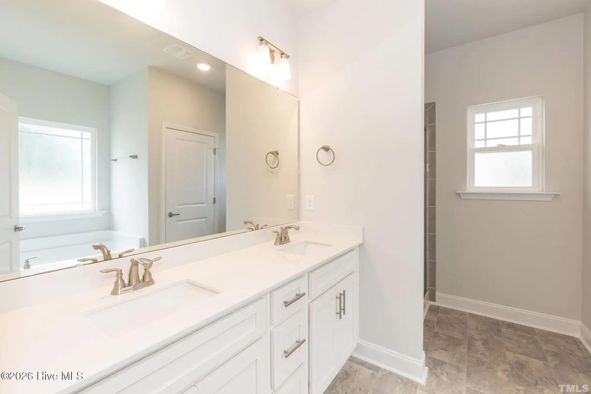 Only $1000 down and financial incentives offered with use of a preferred lender. Photos are of the same floor plan in a different community and are for layout purposes only. Upgrades, colors and finishes may differ. *This home is still under construction* - 3138 Firefly Trail, Grimesland, NC 27837