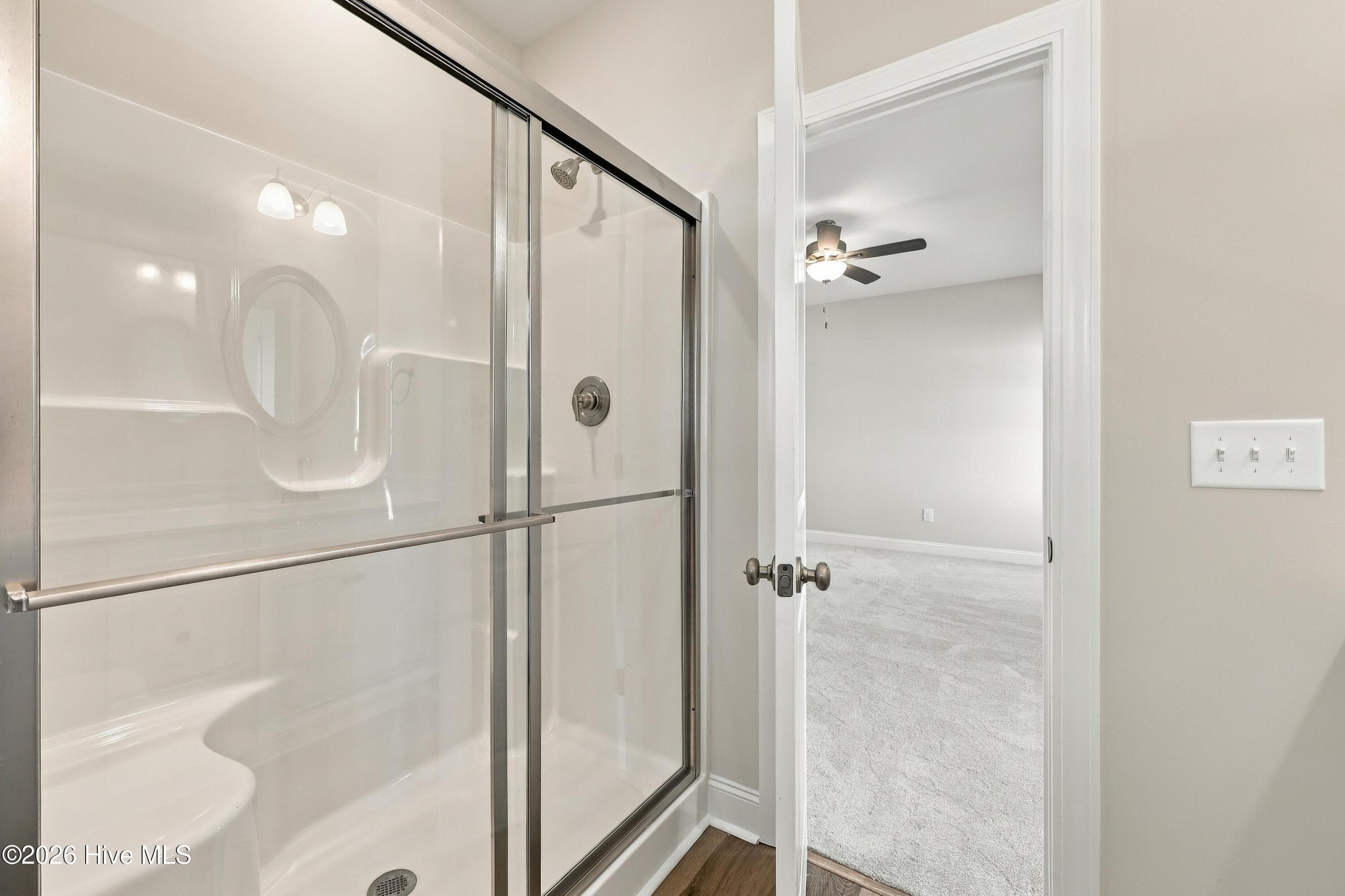 oversized shower with glass doors - 3229 Meadow Drive, Farmville, NC 27828