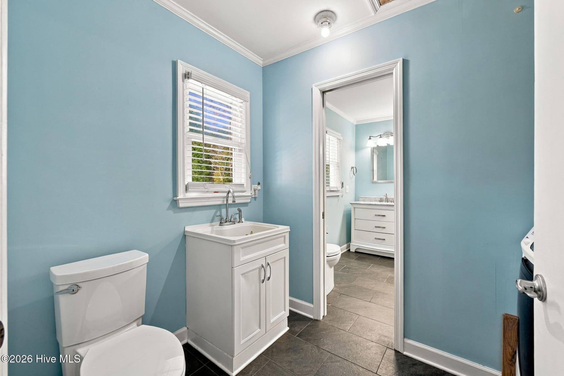 laundry room with 1/2 bath - 1405 Antioch Road, New Bern, NC 28560