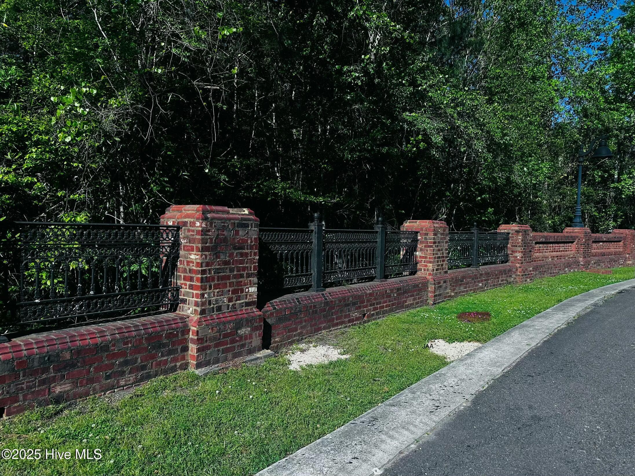 Classic brick details, well-maintained curbed streets, and thoughtfully designed amenities complement the timeless architecture found throughout the community. - 3088 130 Brackenbury Street SW, Shallotte, NC 28470, Shallotte
