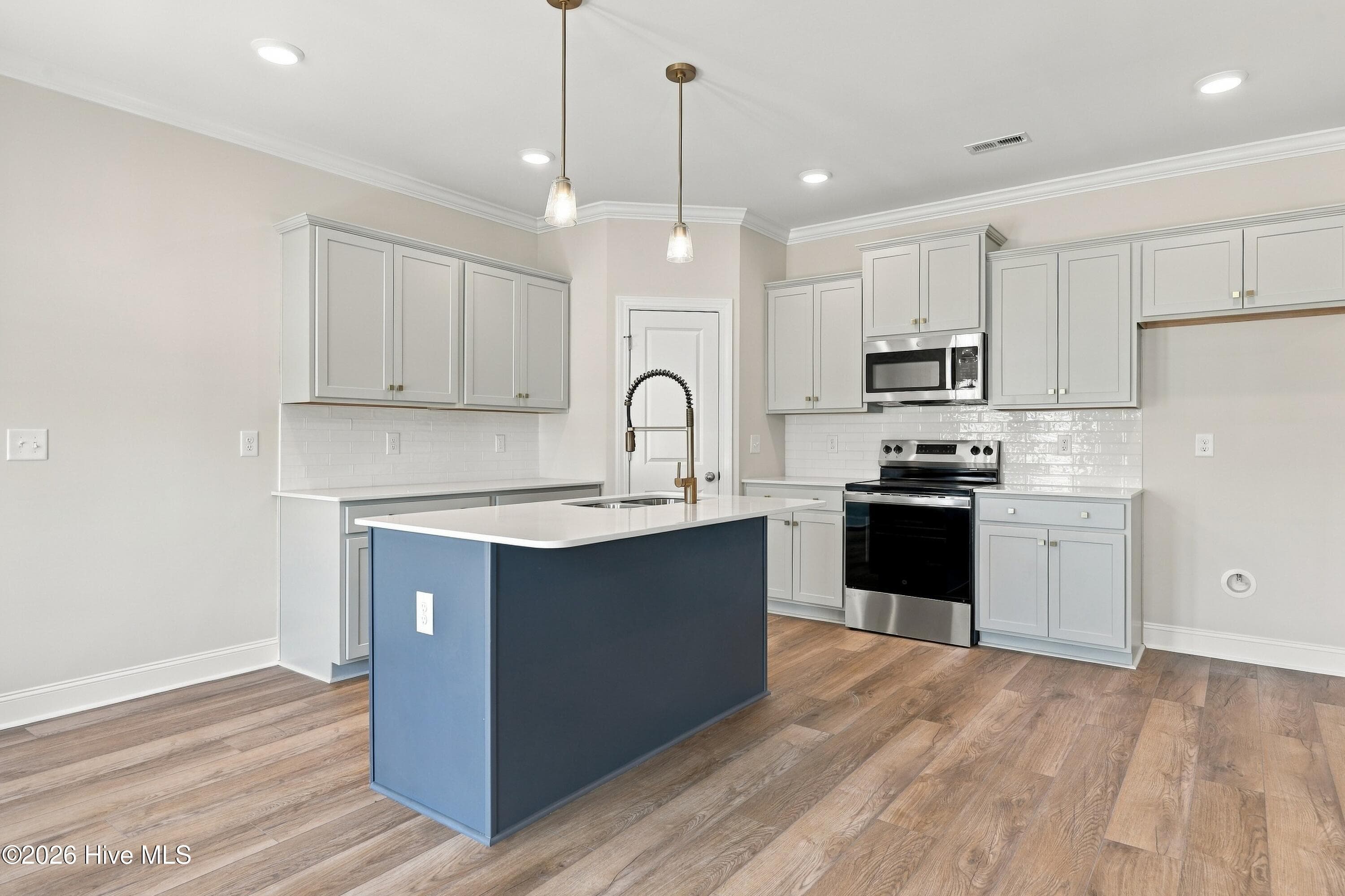 open kitchen with corner pantry - 3229 Meadow Drive, Farmville, NC 27828