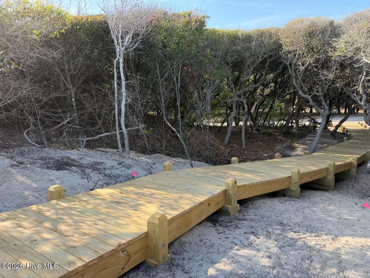 Roosevelt Reserve’s exclusive beach access, currently taking shape, will
guide residents through the dunes to the pristine beaches. - 106 Lot 6 6 Roosevelt Reserve Park Avenue, Pine Knoll Shores, NC 28512