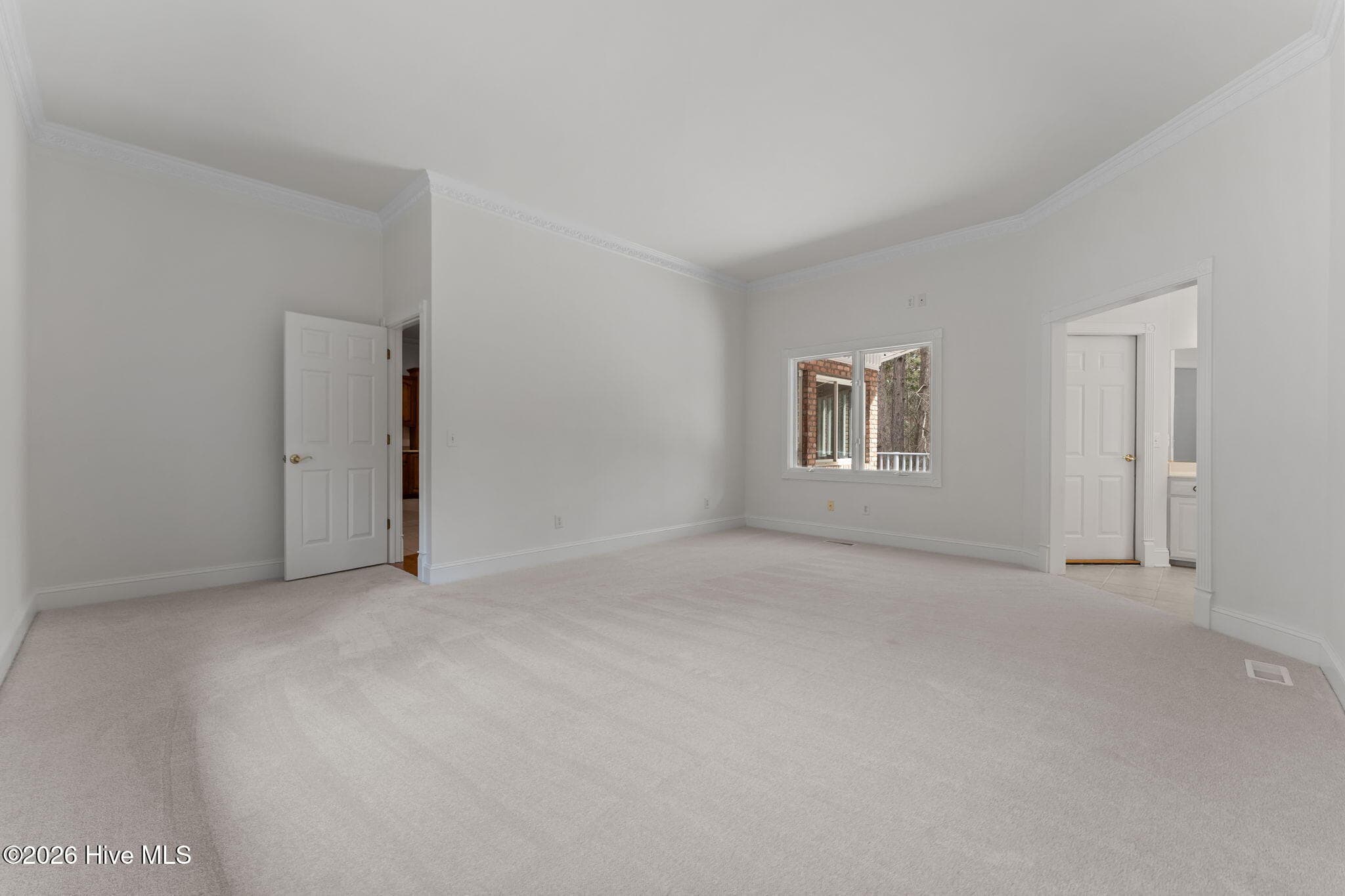 Looking from the closets to the bedroom entrance. - 22 Lochmere Drive, Pinehurst, NC 28374