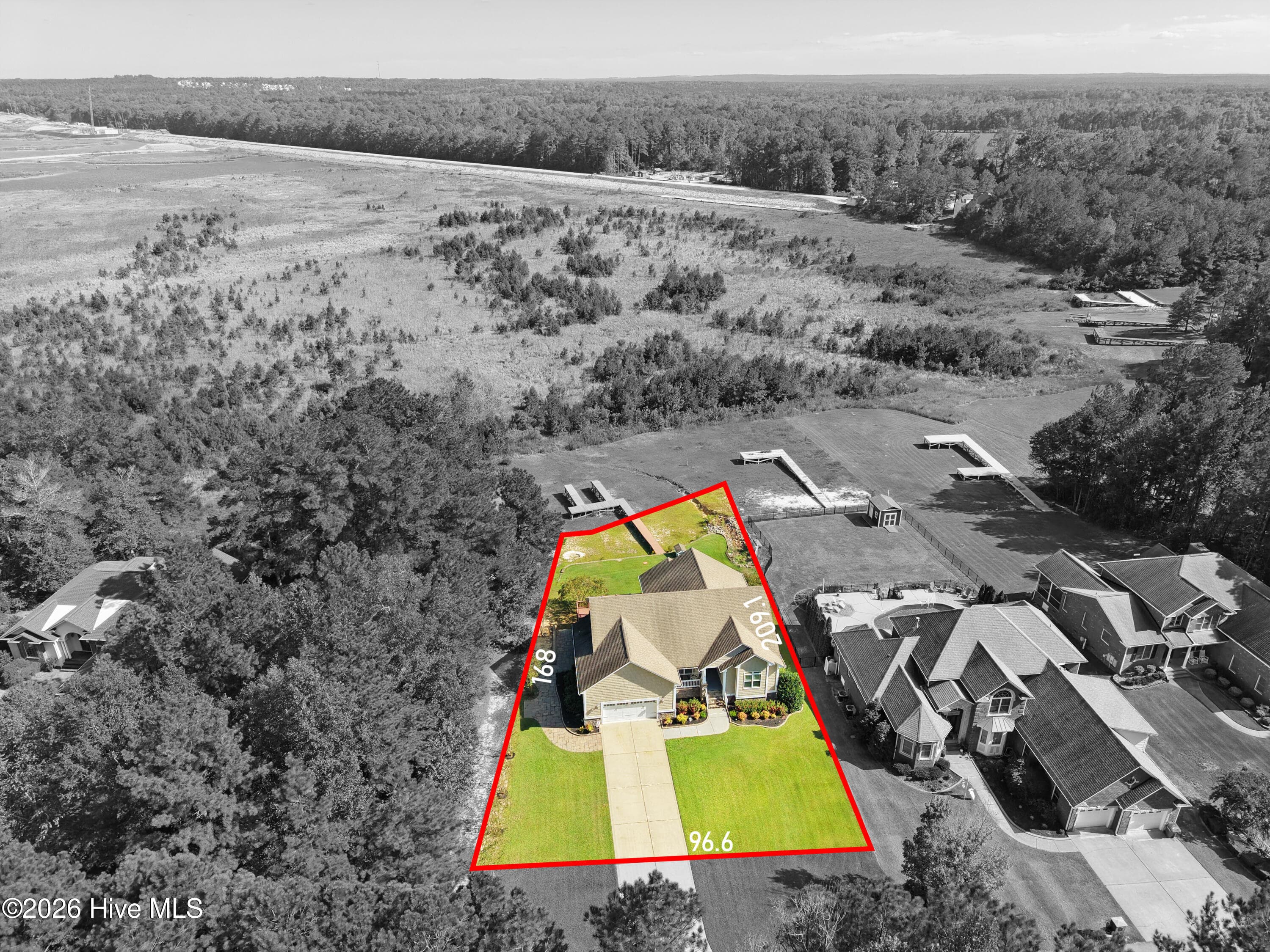 Rear aerial of 899 Seagull Drive, surroundings digitally grayed to highlight property. Lot lines approximate, for illustration only, and digitally added. They do not constitute a survey. Buyers are encouraged to verify property boundaries through recorded documents and a current survey as part of their due diligence.
" - 899 Seagull Drive, Vass, NC 28394, Vass