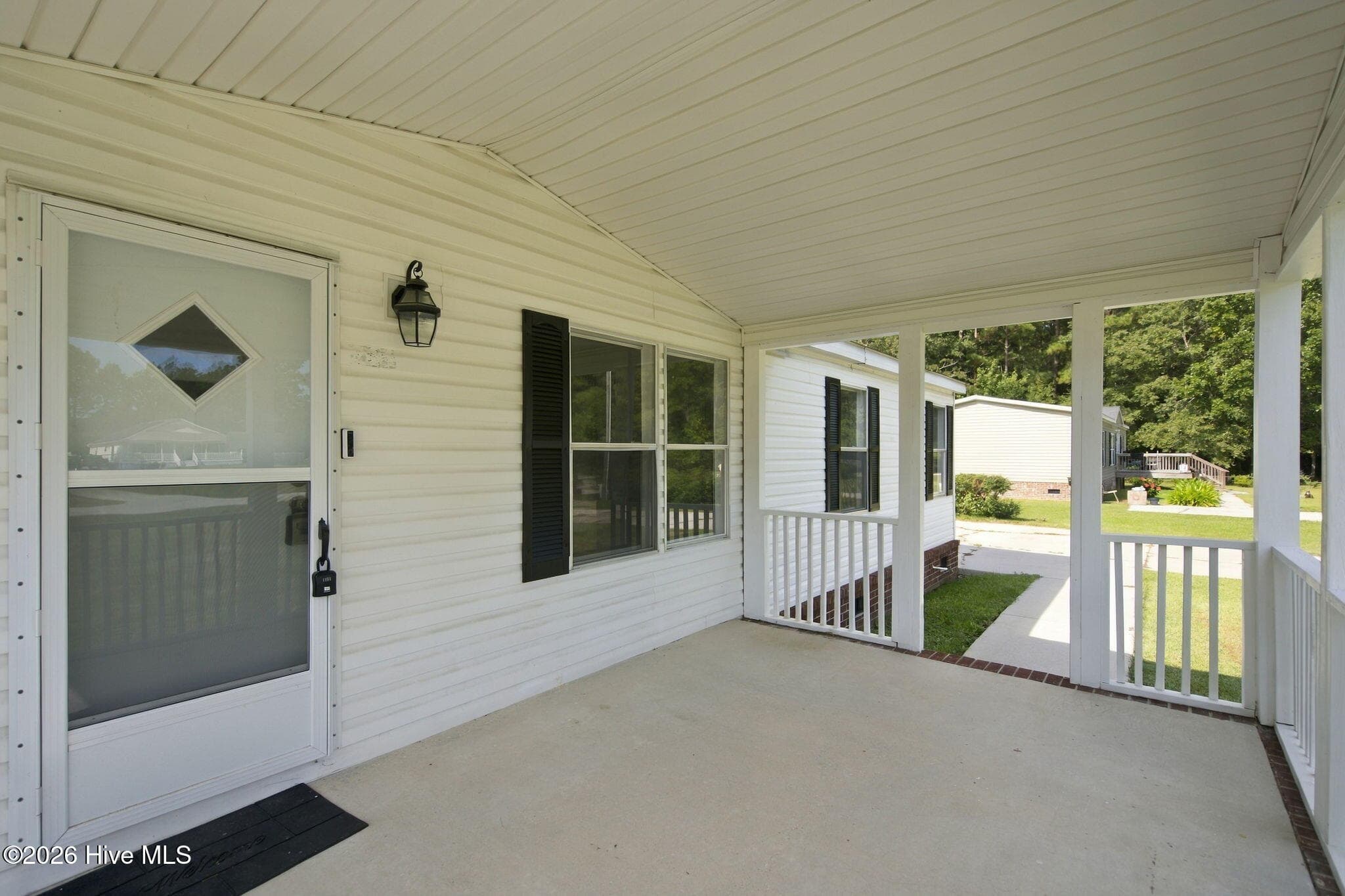 Manufactured Home at 185 New Hope Lane SE, Leland, NC 28451, photo 4 of 49