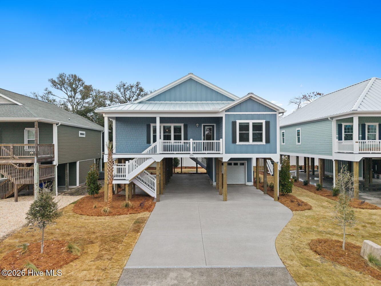 Photo is for illustrative purposes only of a similar home of same plan - 310 NE 58th Street, Oak Island, NC 28465