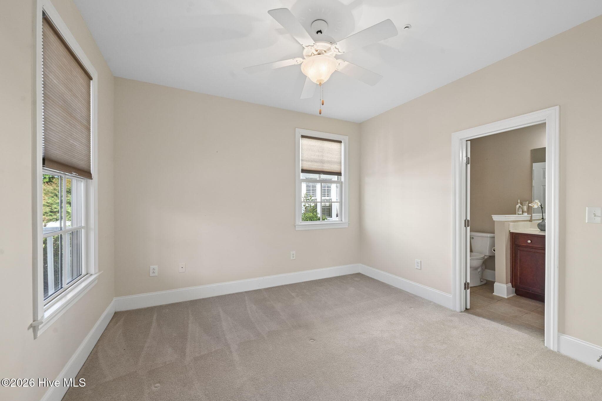 Bedroom #1 with adjoining bathroom on Main Floor. - 207 S Academy Street, Washington, NC 27889
