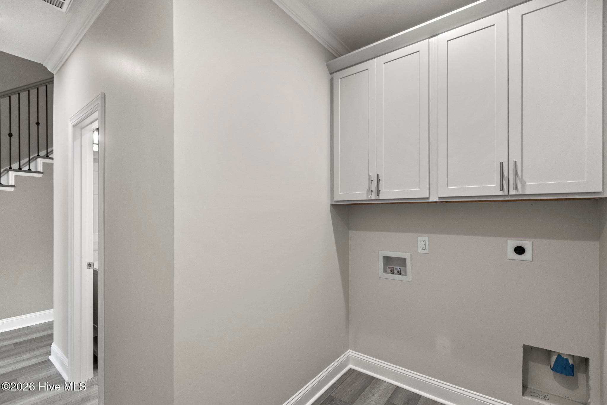 main floor laundry room off garage - 401 King Richard Court, Jacksonville, NC 28546
