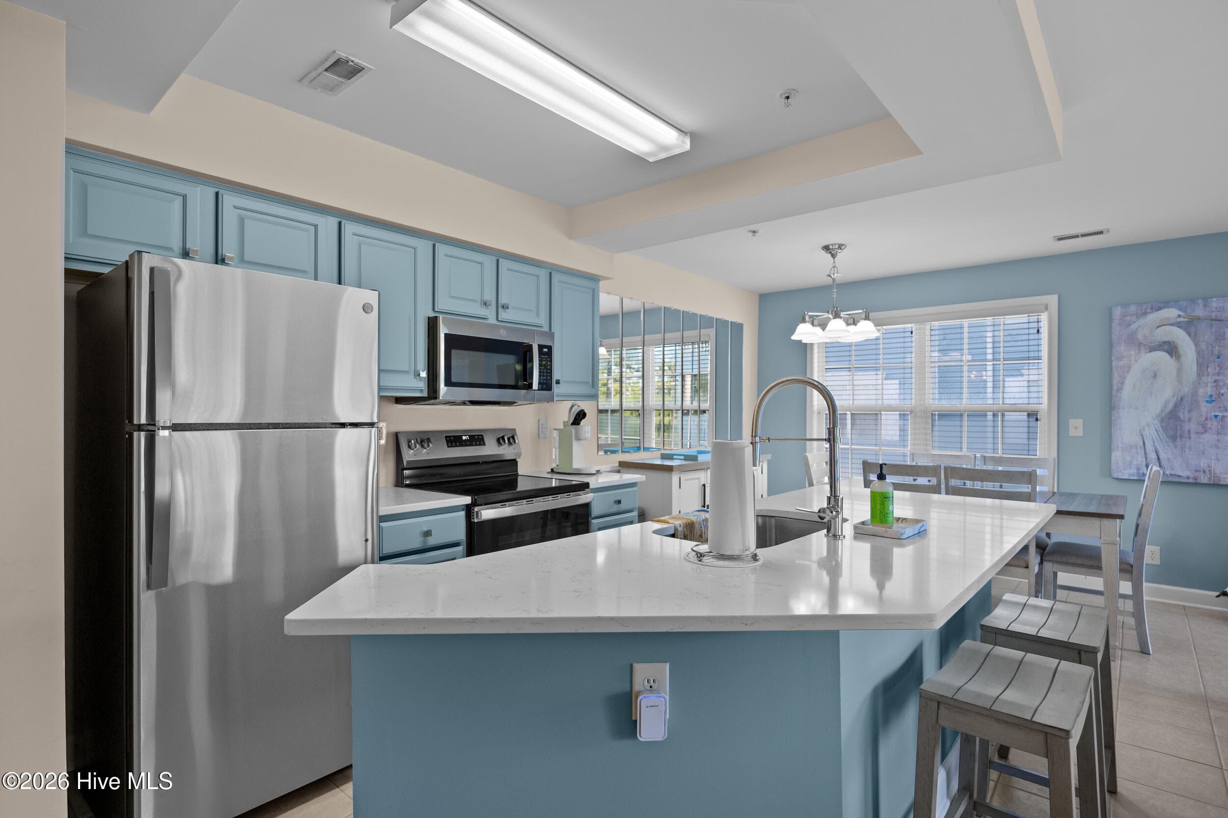Villa - Kitchen - expansive center island bar with seating - 1215 N Middleton Drive NW 2304, Calabash, NC 28467
