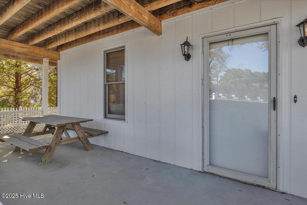 First Floor Covered Porch - 2507 E Oak Island Drive, Oak Island, NC 28465, Oak Island