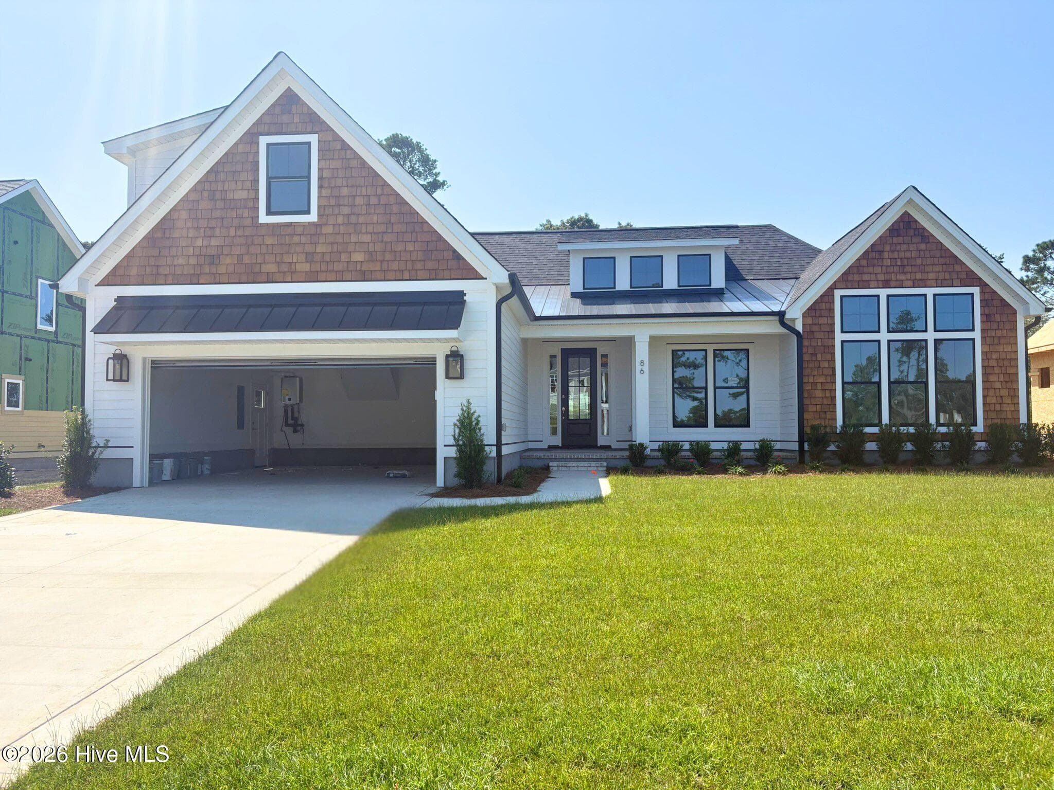 Single Family Residence at 86 Delphi Trace, Hampstead, NC 28443, photo 3 of 107