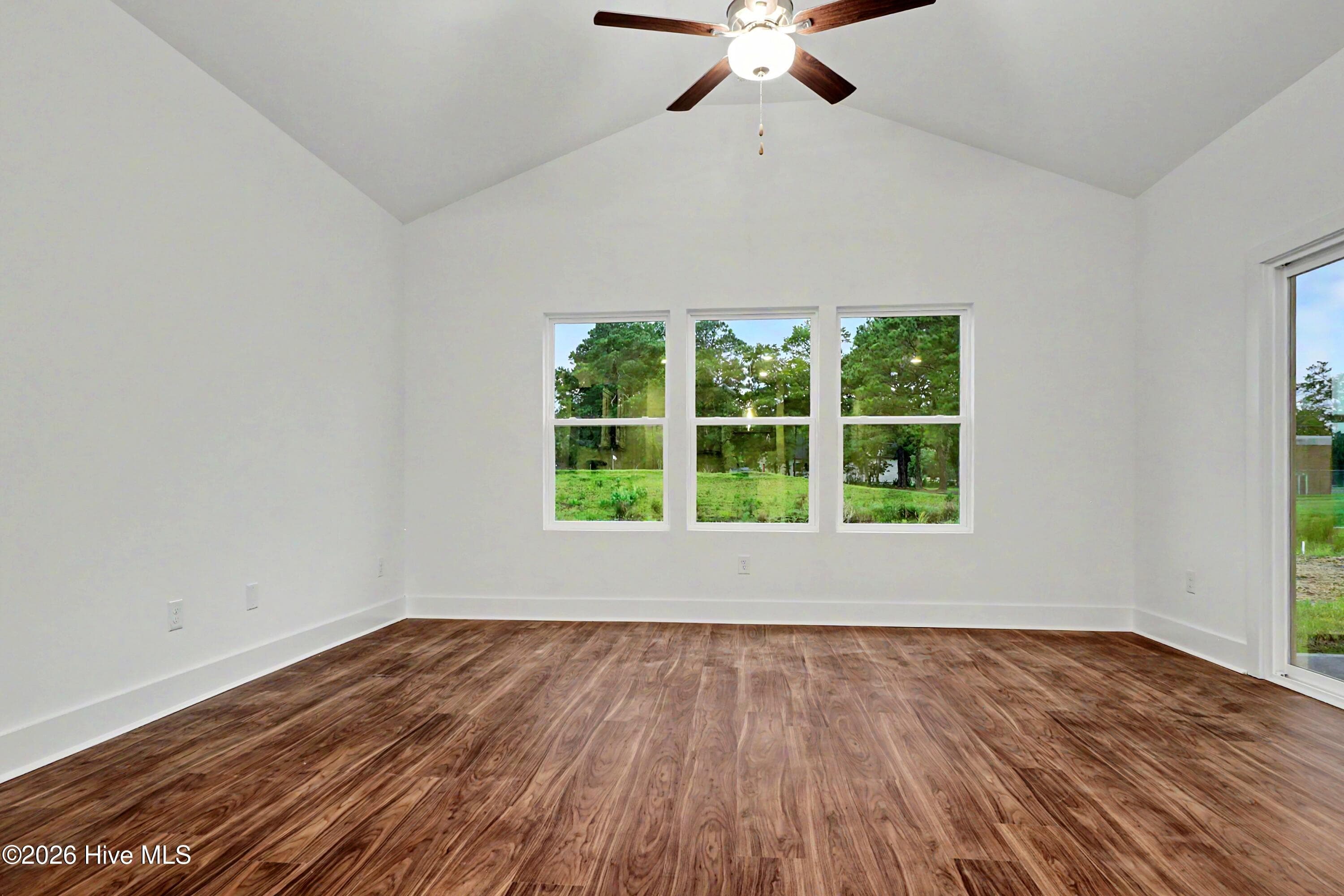 Great Room with Vaulted Ceiling and Access to Covered Patio - 2114 Cregan Cove SW (Lot 3), Ocean Isle Beach, NC 28469