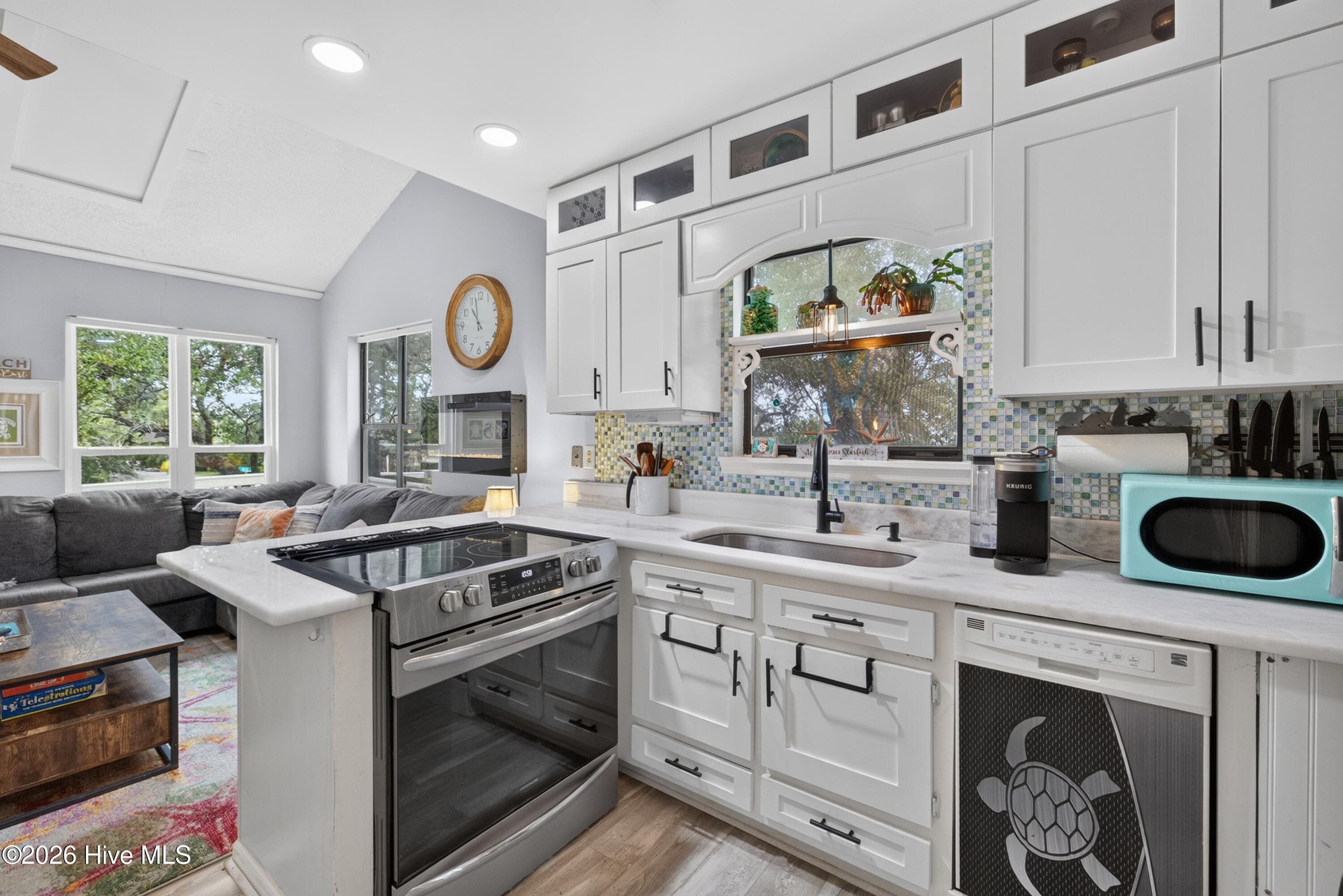 Kitchen with MARBLE counter tops and slide in stove. - 301 Bay Circle, North Topsail Beach, NC 28460