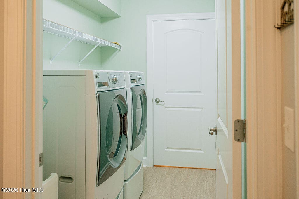 Laundry room - appliances included - 123 W Chelsea Court, Southern Pines, NC 28387