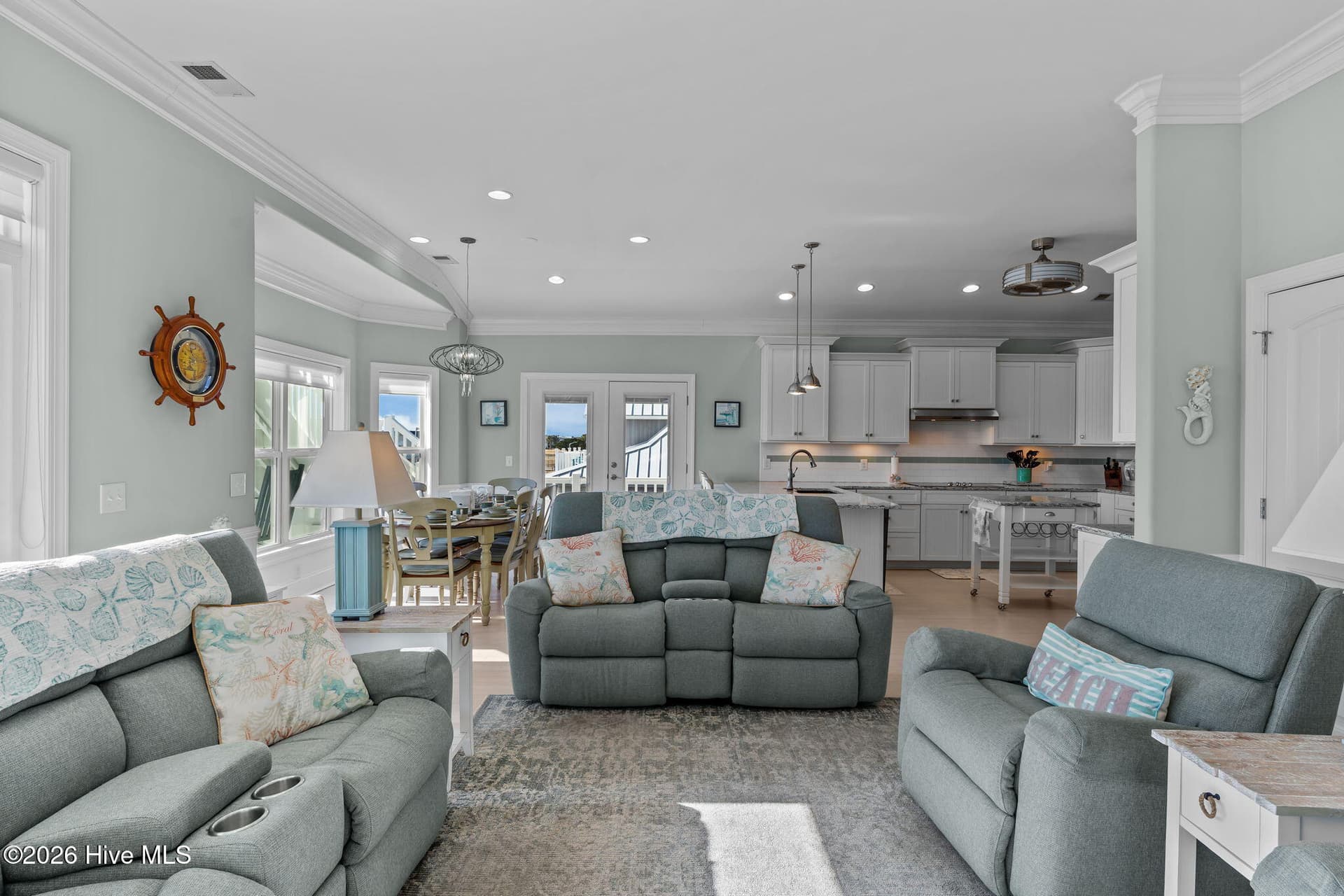 Main living room. Notice luxury crown molding, huge windows and large spaces. - 3 Gatha Lane, Ocean Isle Beach, NC 28469