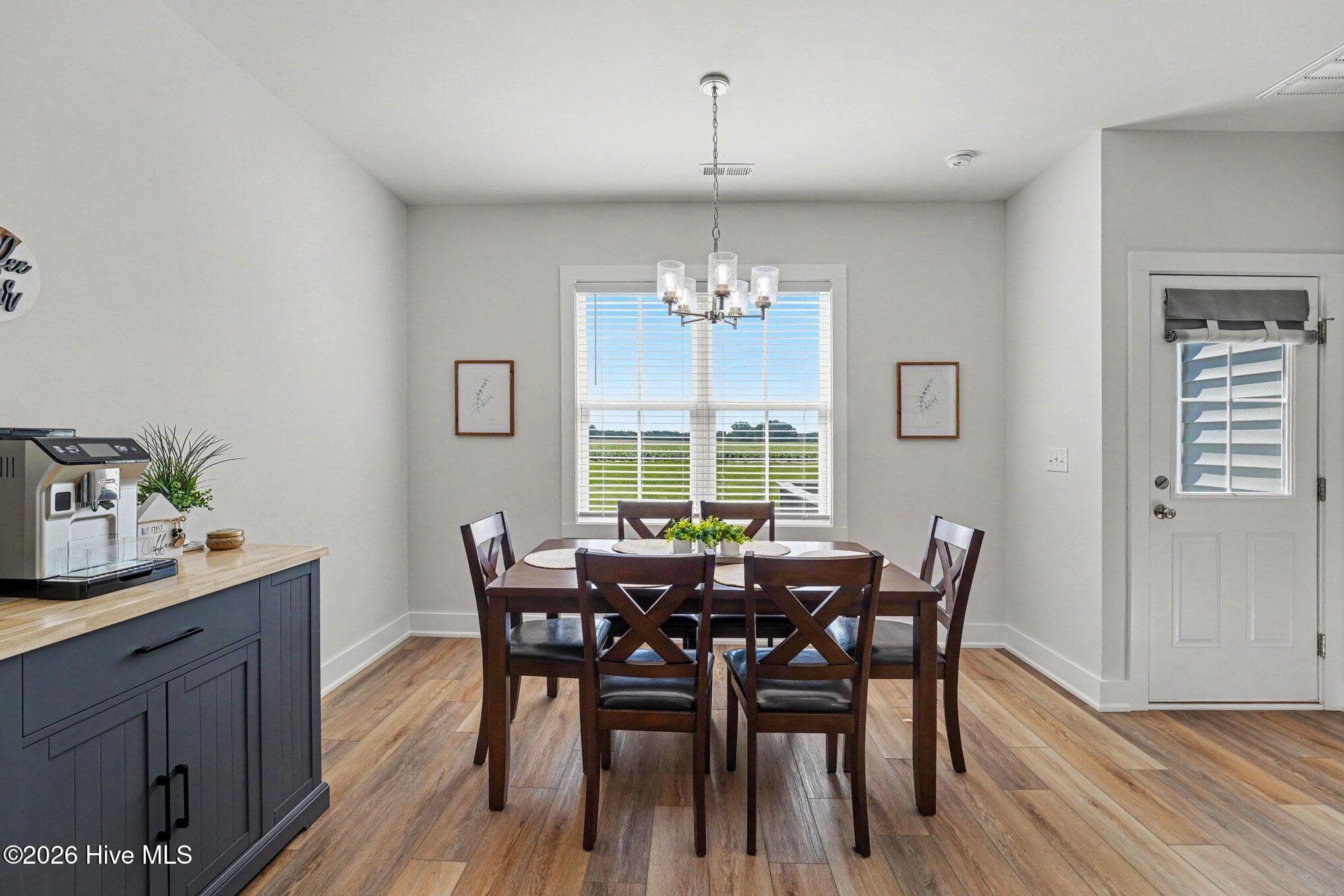 Dining room overlooks large back yard - 176 Glenwood Place, Kenly, NC 27542
