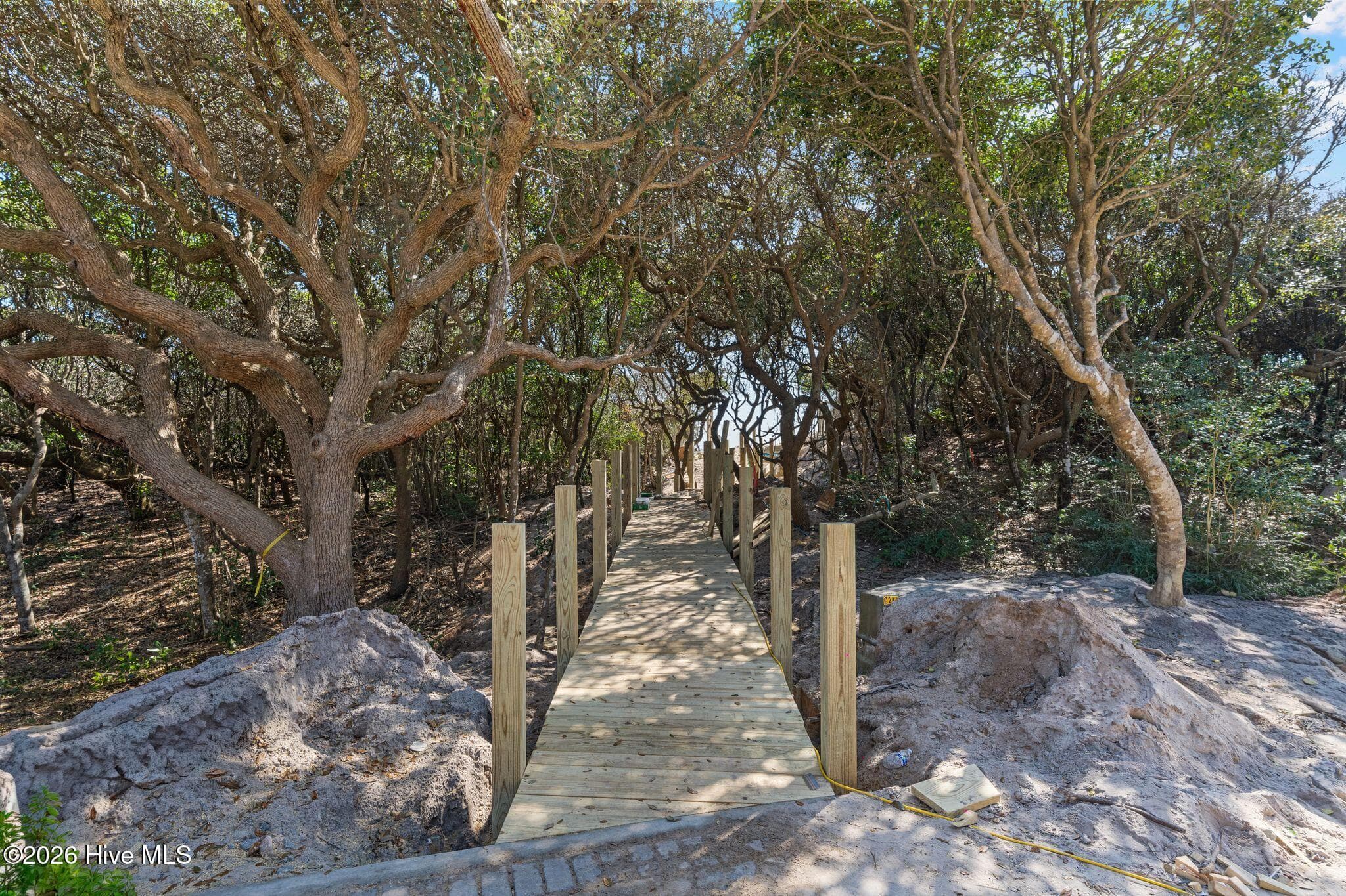 Roosevelt Reserve’s exclusive beach access begins with a scenic boardwalk
winding through the maritime forest toward the beaches of North Carolina’s
Crystal Coast - 106 Lot 6 6 Roosevelt Reserve Park Avenue, Pine Knoll Shores, NC 28512