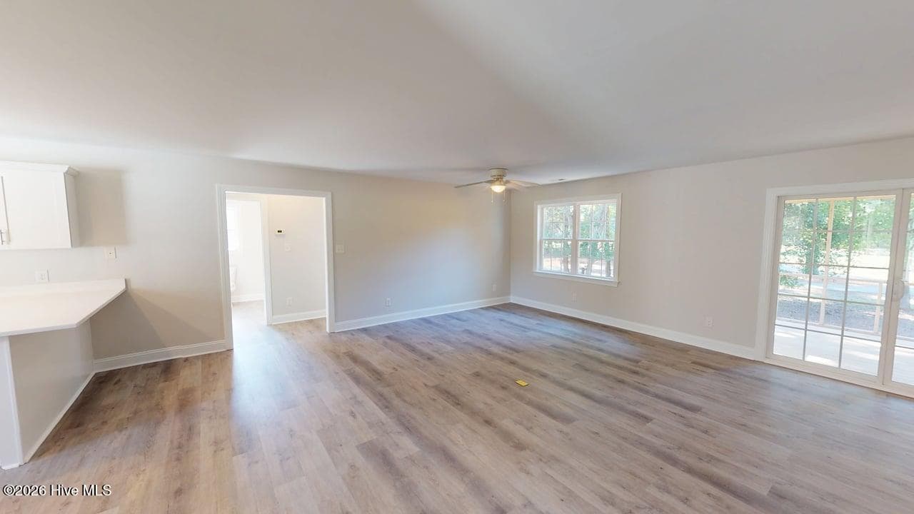 Open floor plan dining and living room. - 1114 Barkentine Drive, New Bern, NC 28560