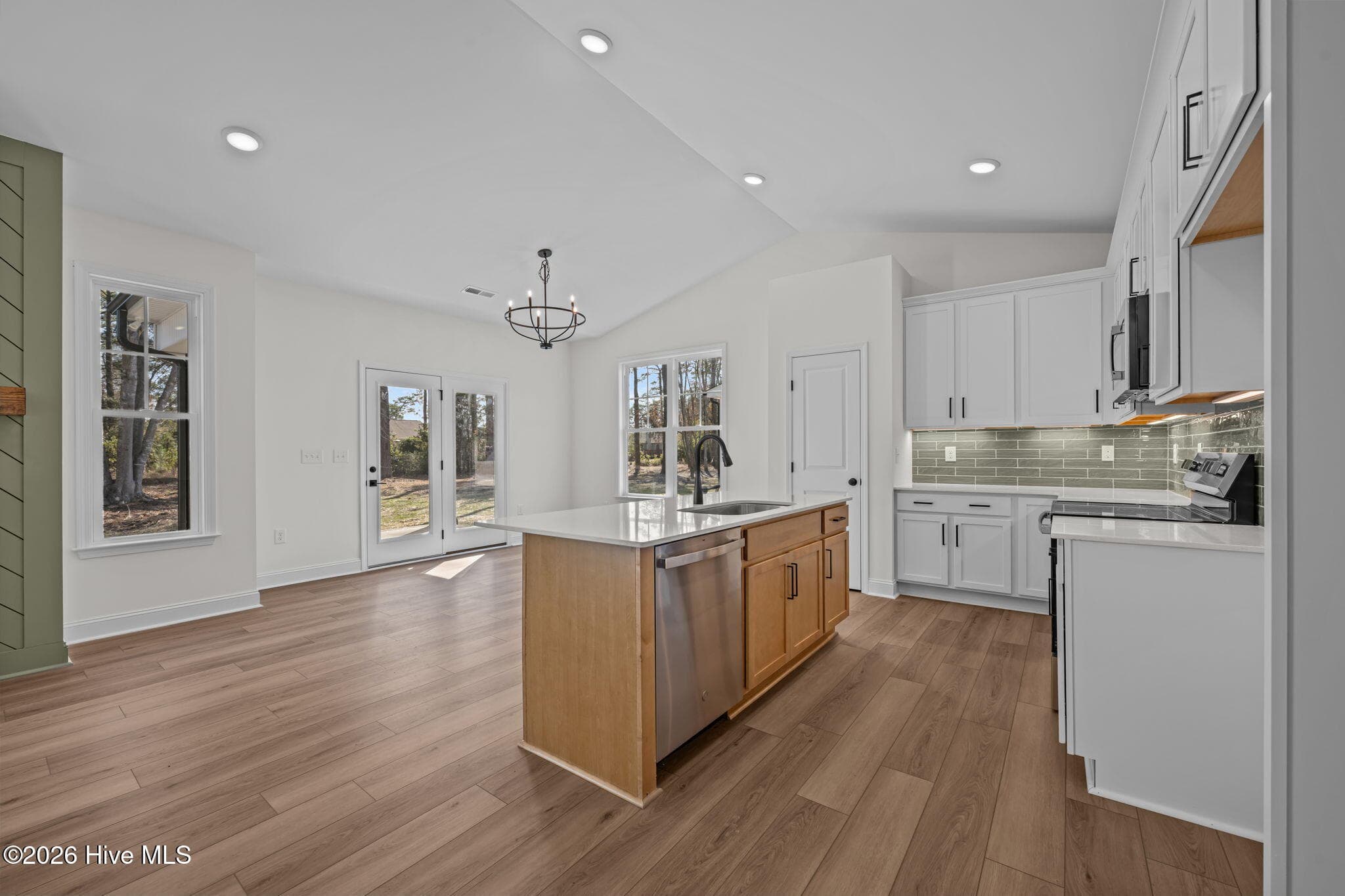 Kitchen island makes a great work station - 1216 Petite Terre Court, New Bern, NC 28560