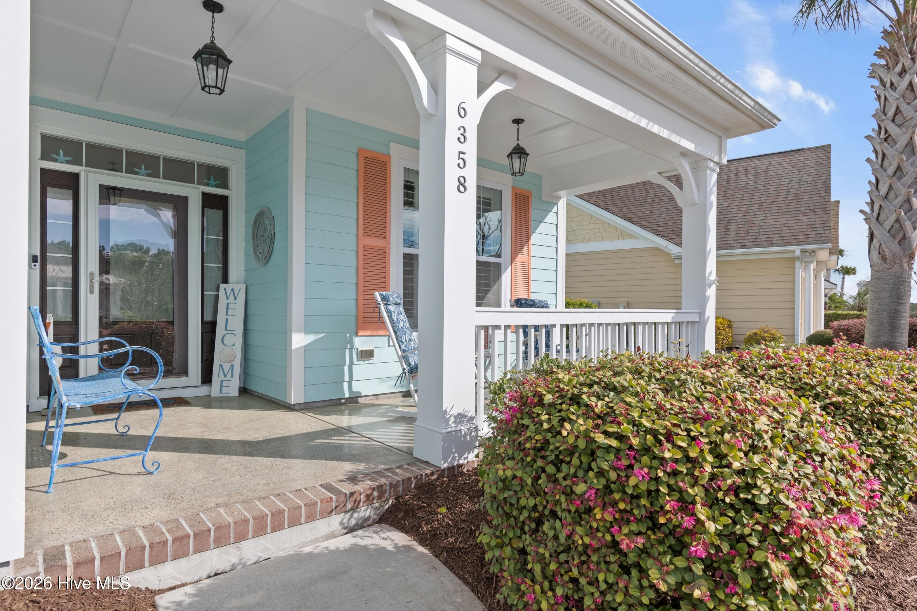 Front porch seating area. - 6358 Bryson Drive SW, Ocean Isle Beach, NC 28469