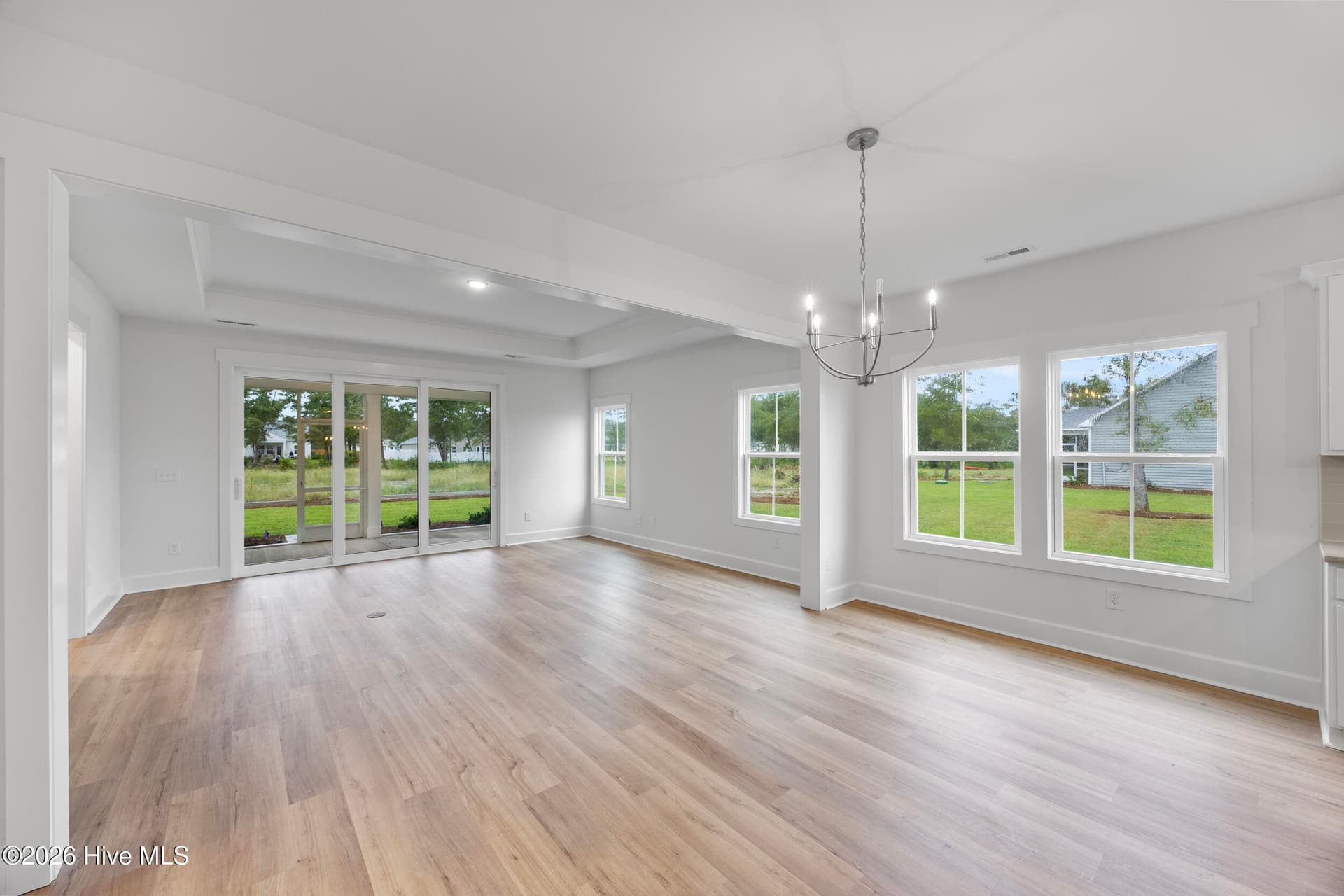 Home shown is a representation of the floor plan and may include optional features or upgrades. Elevations, materials, colors, finishes, square footage, and included features may vary from the actual home. Please consult a Sales Representative for complete details. - 4491 Village Green Drive SW Homesite 93, Shallotte, NC 28470