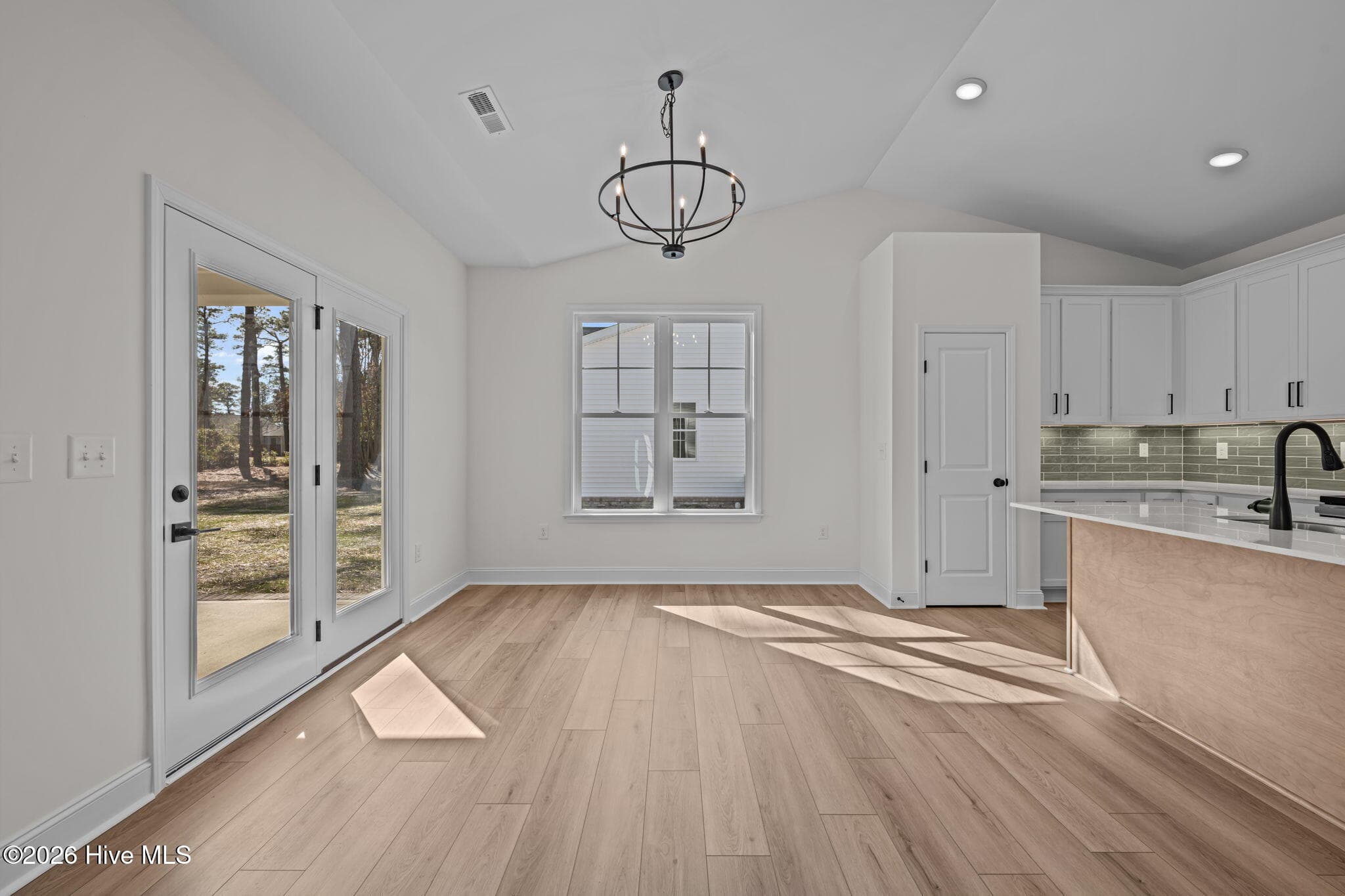 peek out the into the back yard - 1216 Petite Terre Court, New Bern, NC 28560