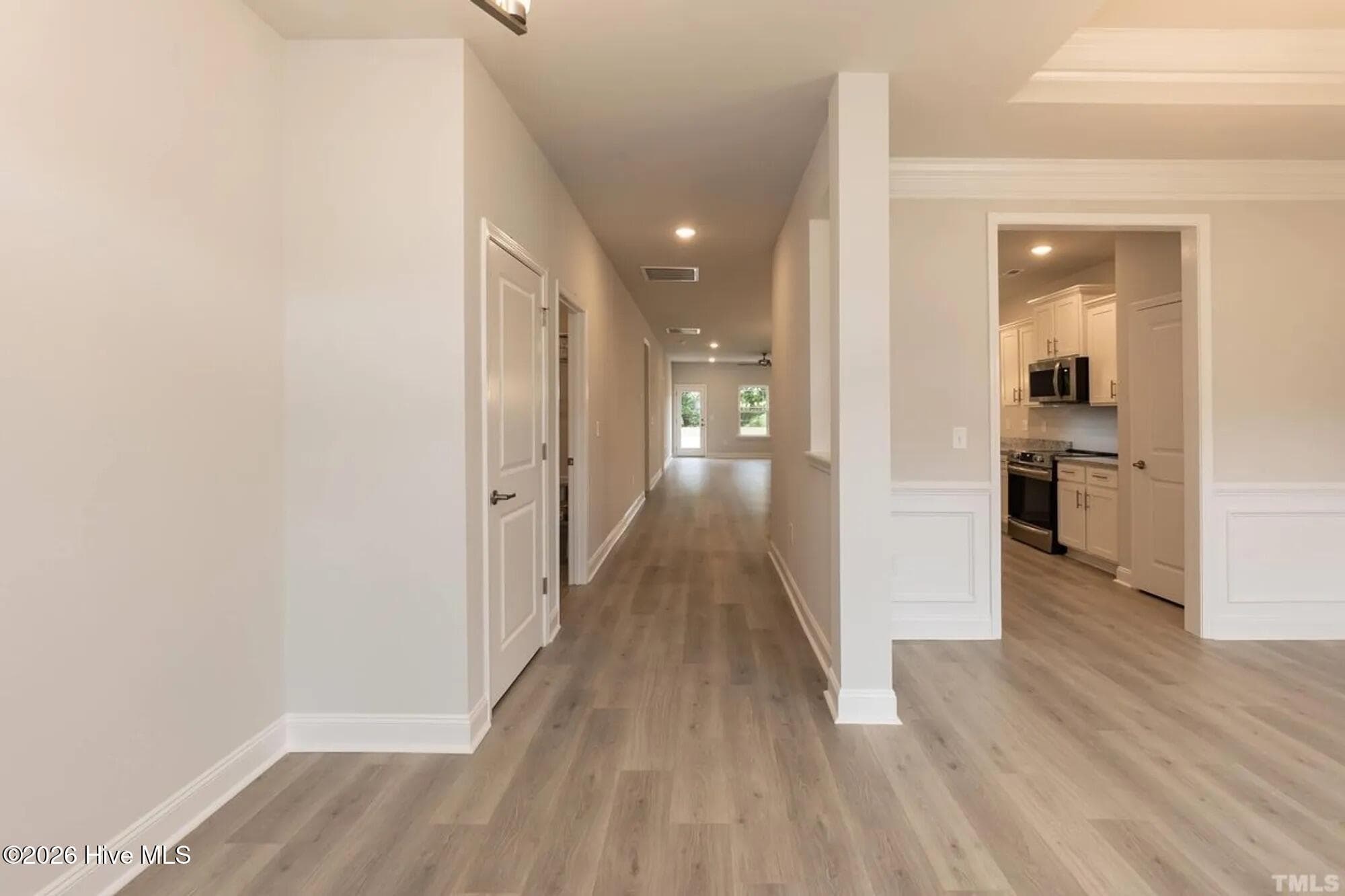 Only $1000 down and financial incentives offered with use of a preferred lender. Photos are of the same floor plan in a different community and are for layout purposes only. Upgrades, colors and finishes may differ. *This home is still under construction* - 3138 Firefly Trail, Grimesland, NC 27837