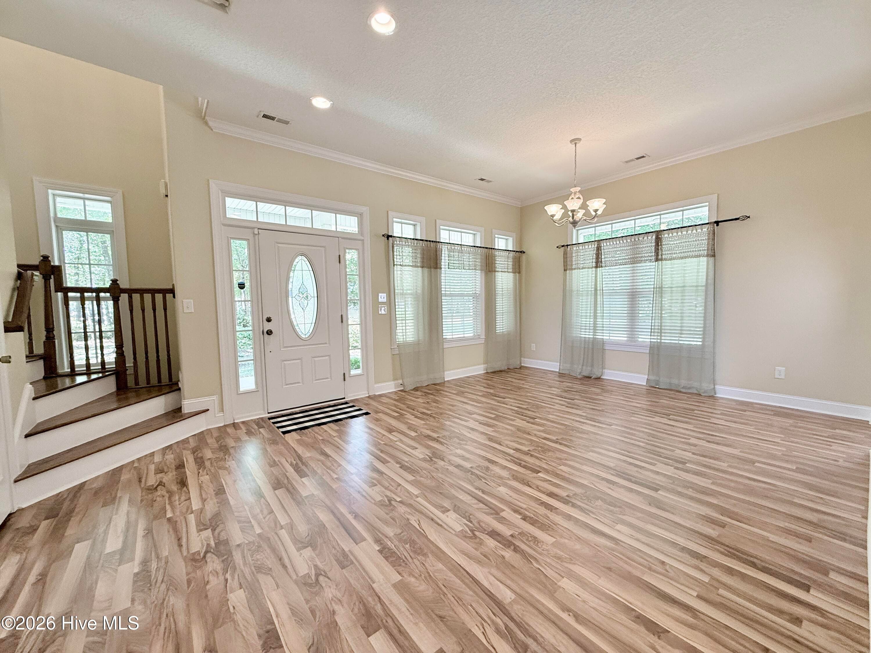 Front door and formal dining room - 109 Sun Burst Circle, Cedar Point, NC 28584