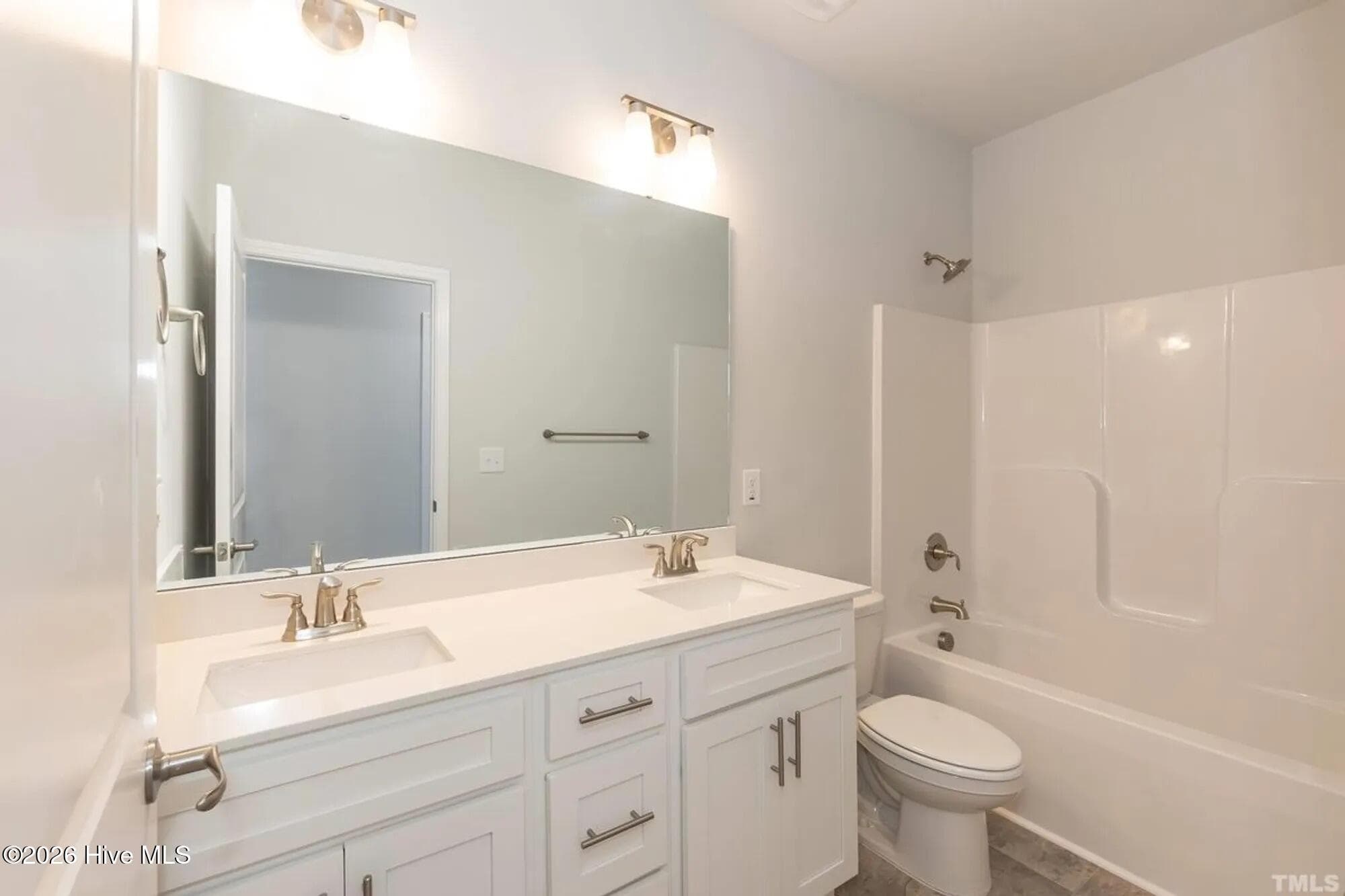 Only $1000 down and financial incentives offered with use of a preferred lender. Photos are of the same floor plan in a different community and are for layout purposes only. Upgrades, colors and finishes may differ. *This home is still under construction* - 3138 Firefly Trail, Grimesland, NC 27837