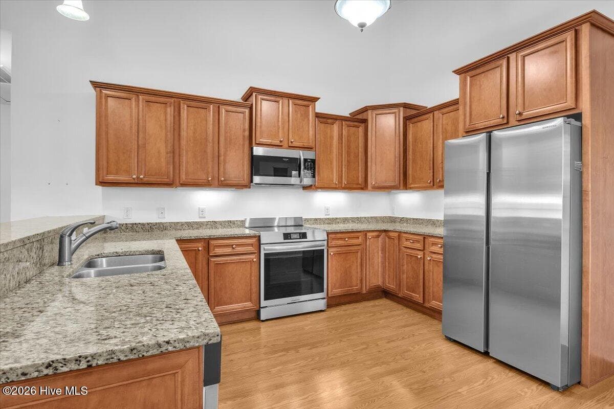 Single Family Residence at 102 NW 4th Street, Oak Island, NC 28465, photo 19 of 61