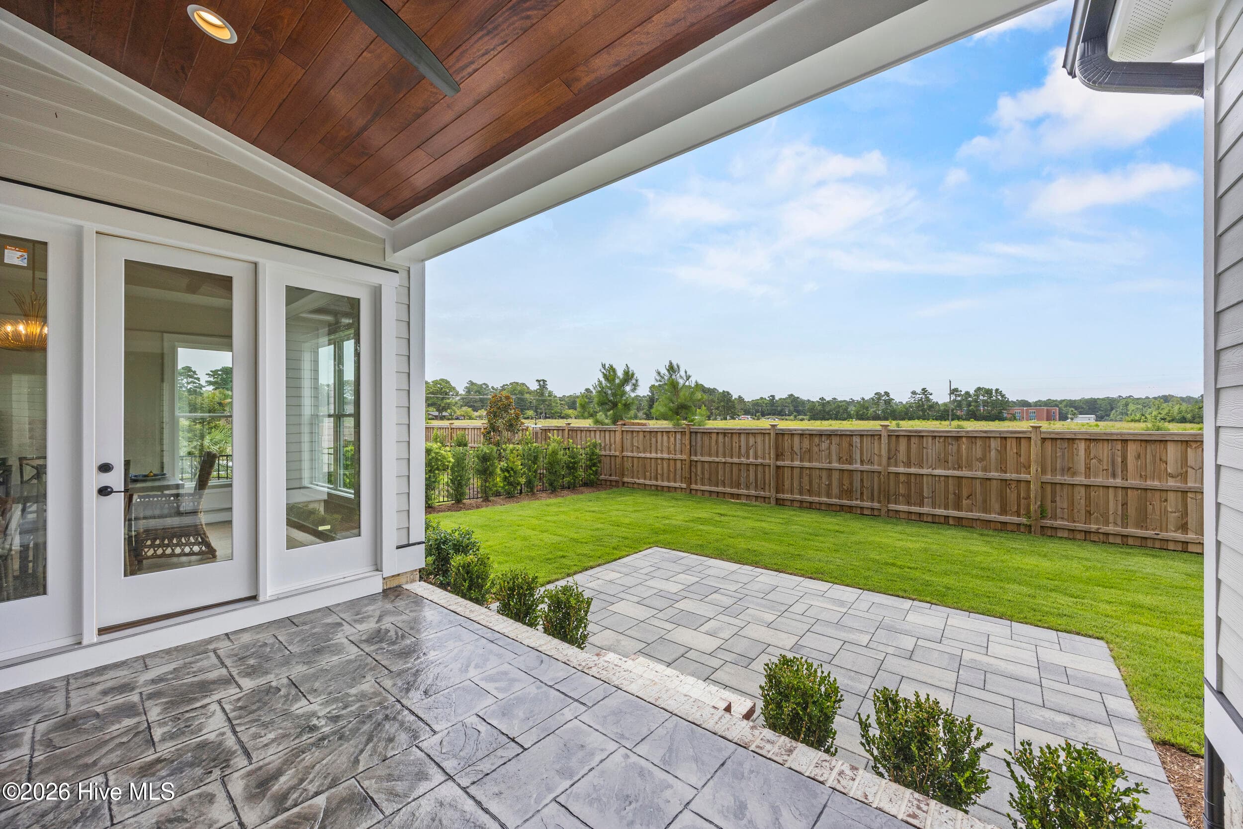 Covered deck and paver patio - 117 Grand Harvest Court, Wilmington, NC 28411